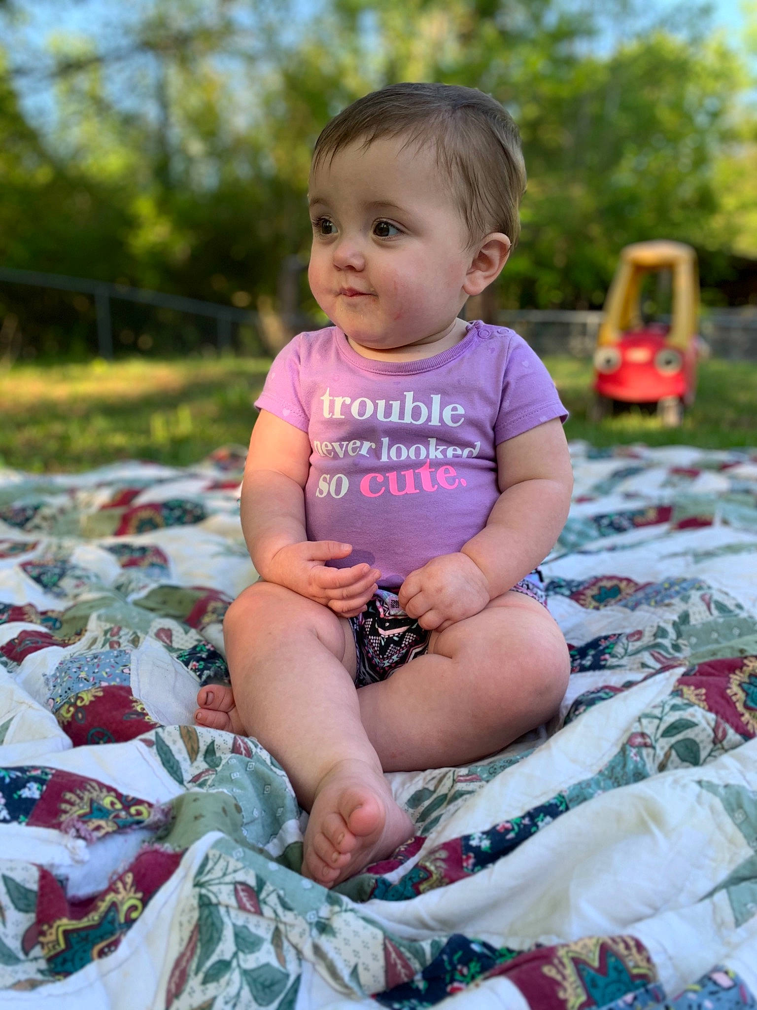 Danielle is registered to the contest to win money with this photo: baby, baby_toddler_clothing, child, eye, face, fun, grass, happy, head, leisure, nature, people_in_nature, person, pink, plant, product, recreation, sky, t_shirt, toddler