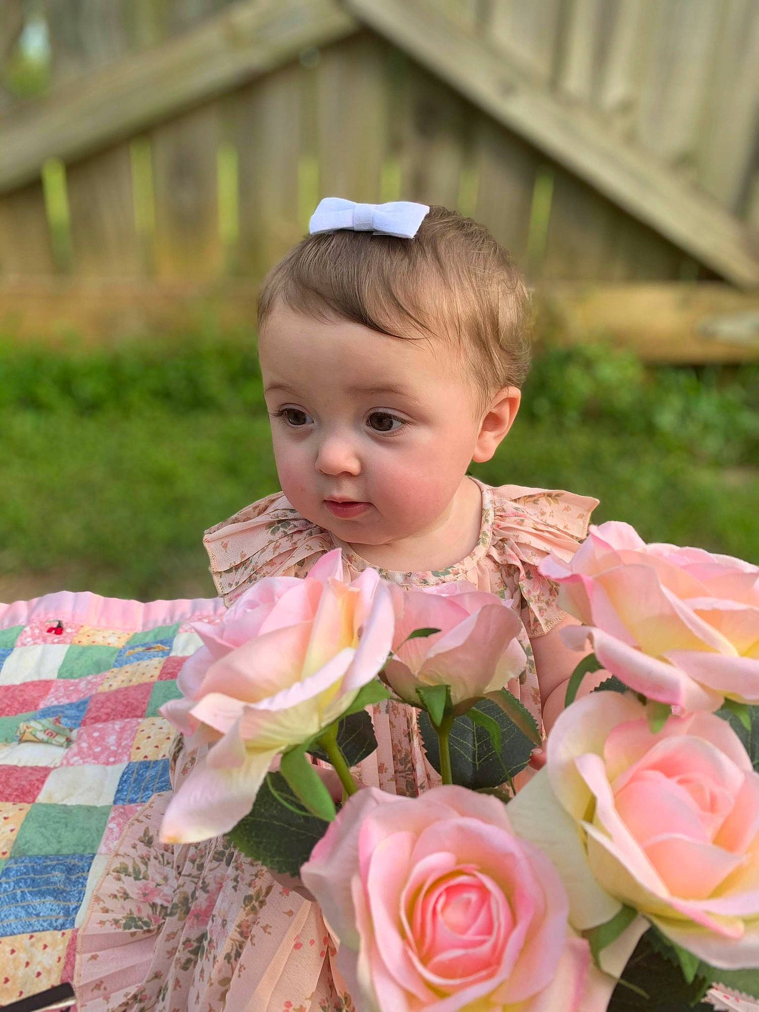 Danielle is registered to the contest to win money with this photo: baby, baby_toddler_clothing, beauty, bouquet, dress, face, flower, flower_arranging, flowering_plant, garden_roses, grass, happy, hybrid_tea_rose, person, petal, pink, plant, rose, rose_family, rose_order