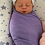 Cali is registered to the contest to win money with this photo: newborn, baby, sleeping, swaddled, blanket, purple, headband, bow, cushion, star_pattern, cute, peaceful, infant, soft, resting, indoors, portrait, child, cozy, wrapped
