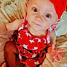Adalynn is registered to the contest to win money with this photo: baby, infant, child, portrait, smiling, sitting, red_dress, red_bow, floral_pattern, blue_eyes, face, hands, blanket, plush_blanket, indoor, close_up, happy, adorable, photography, soft_furniture