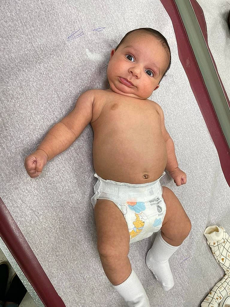 Adrik is registered to the contest to win money with this photo: abdomen, arm, baby, cheek, chest, diaper, finger, head, human_body, iris, knee, mouth, muscle, navel, person, skin, stomach, thigh, thumb, toddler