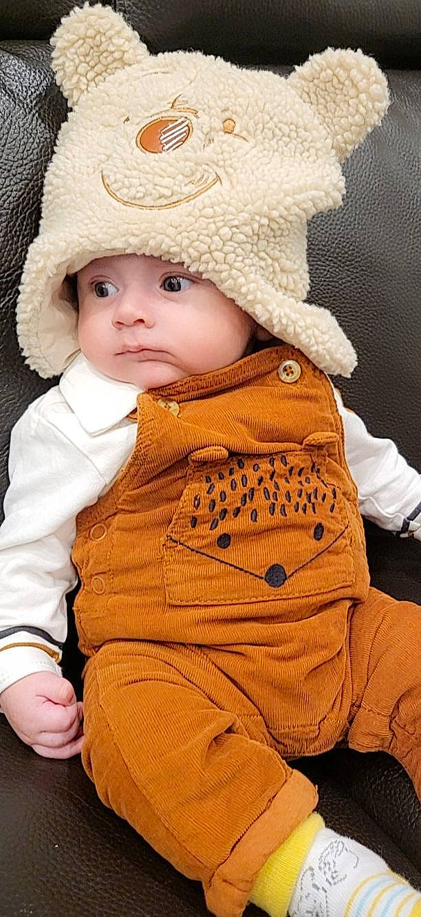 Tyler participe au concours pour gagner de l'argent avec cette photo : baby, baby_toddler_clothing, cap, cheek, child, eye, fashion_accessory, fur, headgear, headwear, hood, jacket, knit_cap, lip, outerwear, person, skin, sleeve, toddler, white