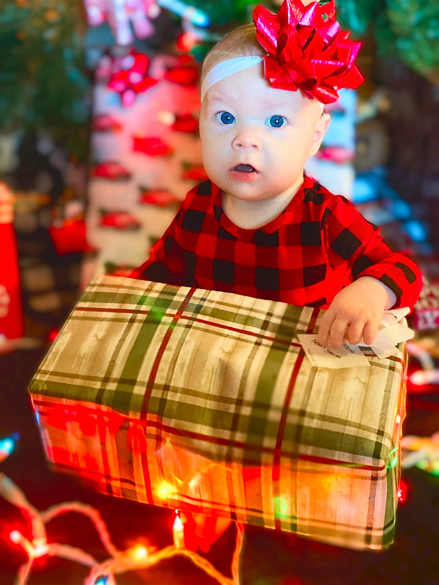 Arizona joined the competition — help win amazing prizes! beauty, child, christmas, christmas_ornament, clothing, facial_expression, fashion, fun, green, happy, head, headwear, holiday, light, lighting, pattern, person, plaid, red, surprise
