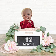 Dixie is registered to the contest to win money with this photo: baby, birthdaycake, box, cake, cream, dessert, face, flower, flowerarrangement, flowerbouquet, food, head, icing, person, petal, photography, plant, portrait, pottedplant, rose