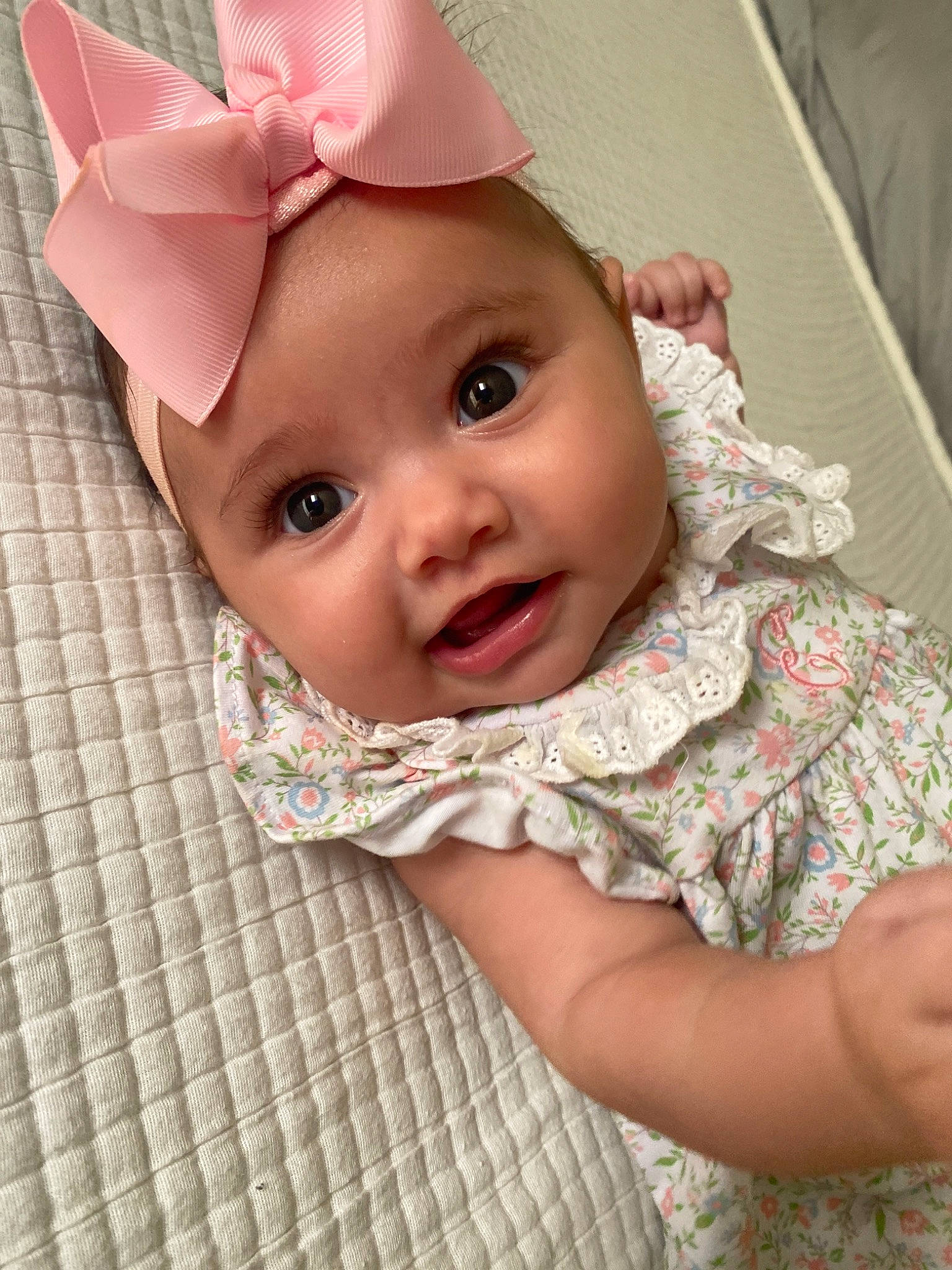 Emma joined the competition — help win amazing prizes! baby, baby_products, baby_toddler_clothing, cheek, child, comfort, dress, eye, happy, headwear, linens, lip, magenta, pattern, person, pink, skin, sleeve, smile, textile