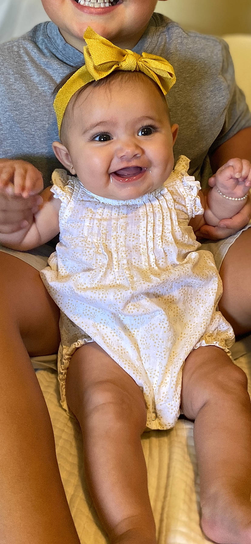 Emma joined the competition — help win amazing prizes! baby, baby_toddler_clothing, chair, cheek, child, dress, eye, face, facial_expression, finger, hairstyle, happy, head, iris, joy, organ, person, pink, skin, smile