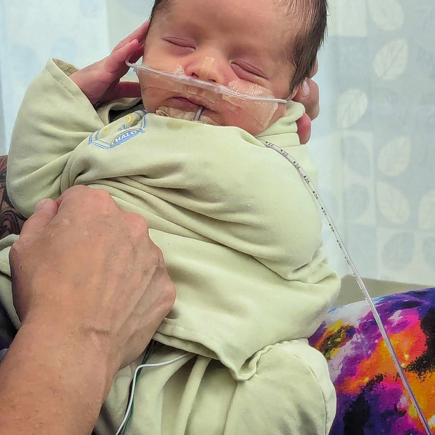 Gabriel joined the competition — help win amazing prizes! accessories, architecture, baby, bodypart, building, clothing, coat, couch, face, finger, furniture, hand, head, hospital, jacket, newborn, person, photography, portrait, purple