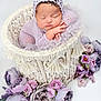 Amira joined the competition — help win amazing prizes! newborn, baby, sleeping, basket, knitwear, lavender, flowers, purple, soft, cozy, infant, cute, peaceful, portrait, headwear, hands, decor, closeup, resting, toddler