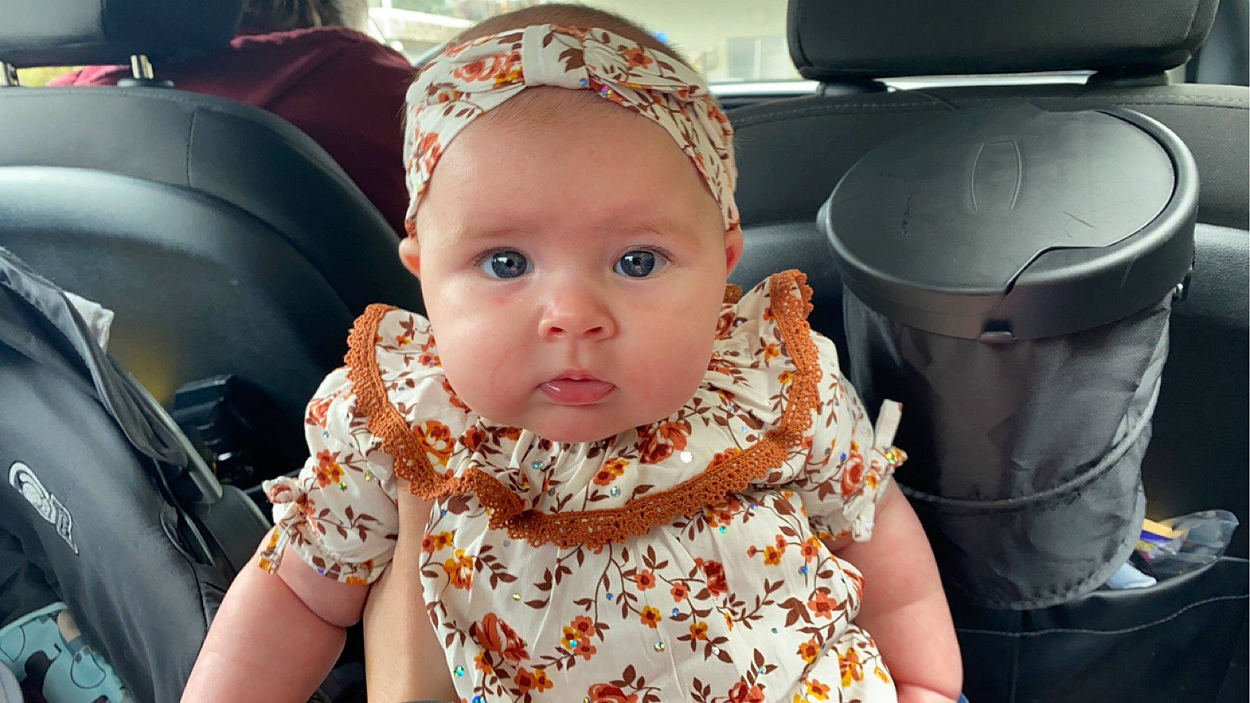 Marie is registered to the contest to win money with this photo: automotive_design, baby, baby_toddler_clothing, cap, car_seat, cheek, child, eyelash, family_car, fashion_accessory, fun, happy, headwear, luxury_vehicle, person, portrait_photography, sitting, sleeve, t_shirt, toddler
