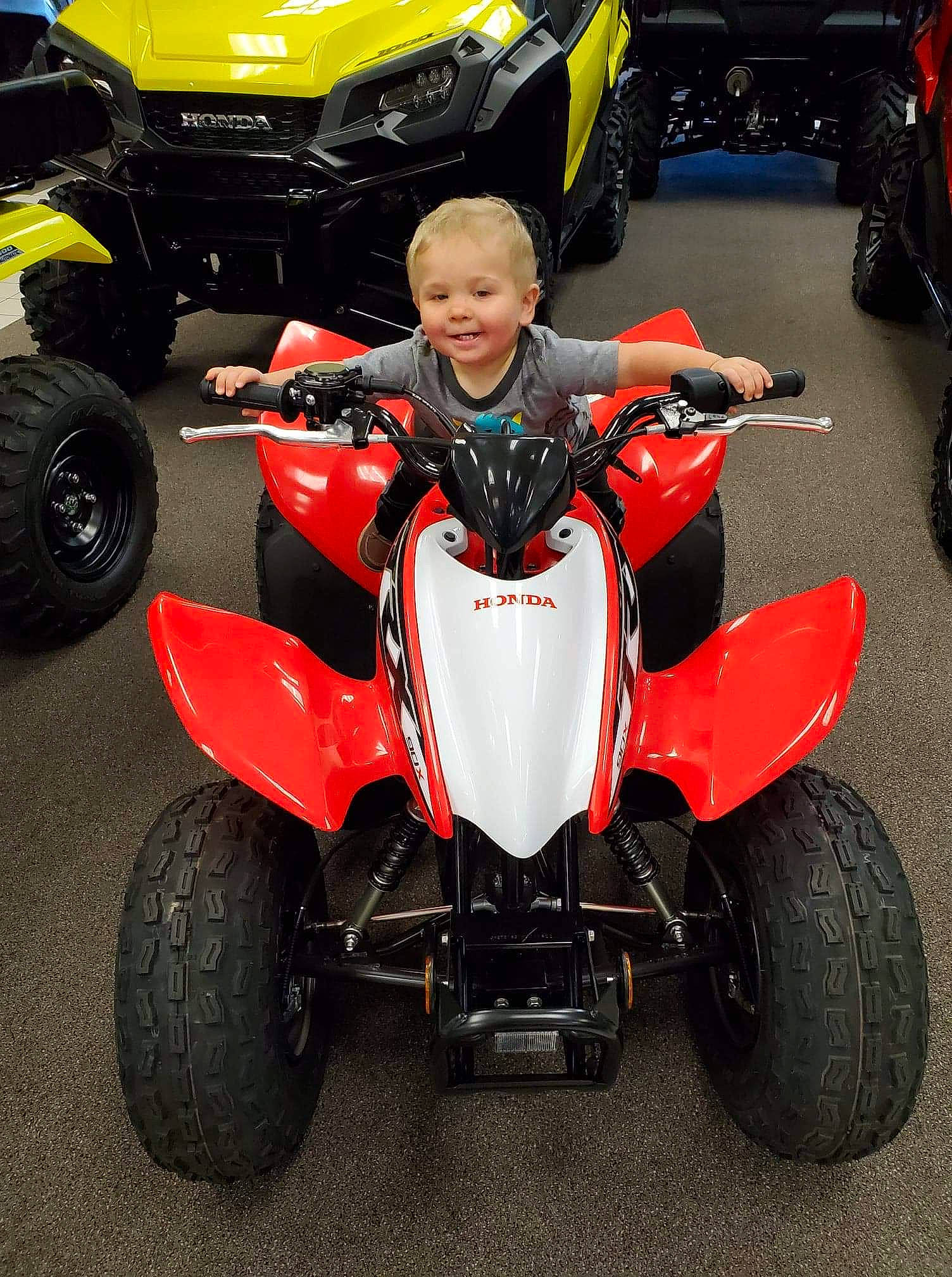 Richard is registered to the contest to win money with this photo: all_terrain_vehicle, auto_part, automotive_design, automotive_exterior, automotive_tire, automotive_wheel_system, bumper, car, joy, land_vehicle, motor_vehicle, motorsport, off_road_vehicle, person, rim, tire, vehicle, wheel