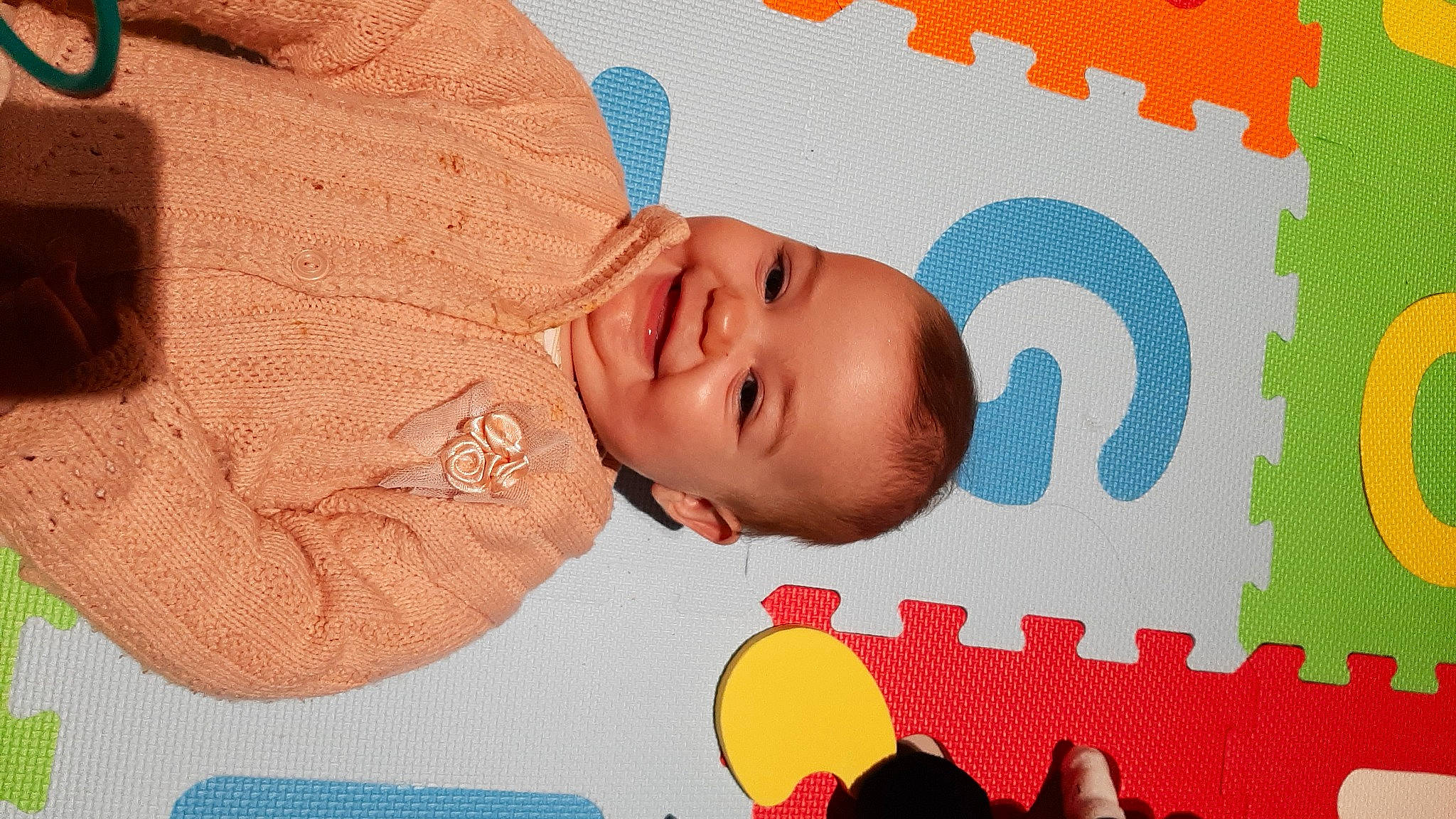 Eva participe au concours pour gagner de l'argent avec cette photo : art, baby, baby_products, baby_toddler_clothing, cheek, child, facial_expression, font, fun, happy, illustration, joy, nose, orange, pattern, person, pink, product, red, smile