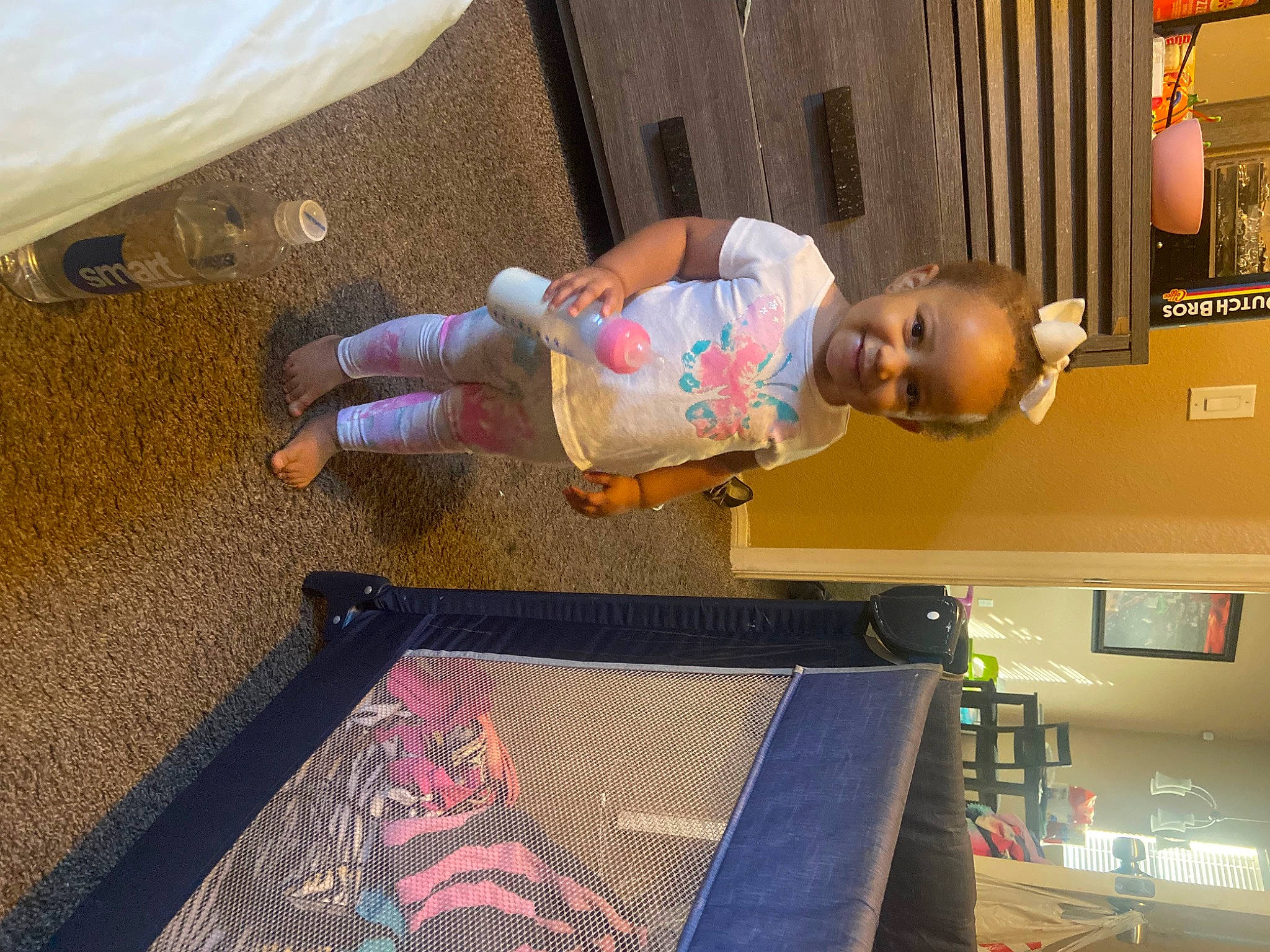 Jayceona Louise is registered to the contest to win money with this photo: art, baby, baby_toddler_clothing, carpet, child, flooring, fun, house, joy, magenta, pattern, person, play, room, smile, toddler, wood
