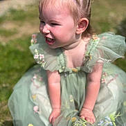 Brooklynn is registered to the contest to win money with this photo: toddler, child, smiling, outdoor, grass, green_dress, braided_hair, sunlight, happy, cute, flower_embroidery, baby, person, portrait, daylight, nature, small_hands, young_child, playful, cheerful