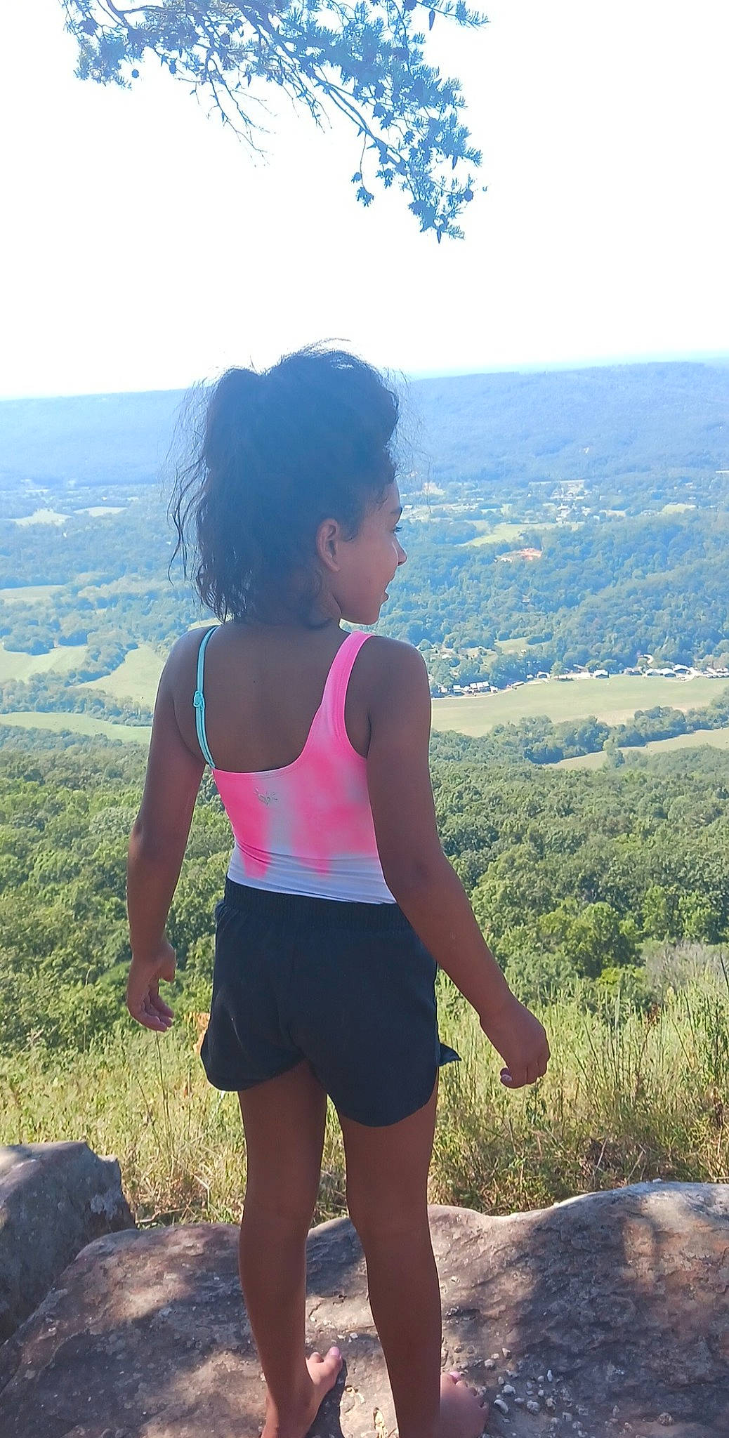 Ameliana joined the competition — help win amazing prizes! grass, grassland, happy, human_body, knee, landscape, leg, leisure, people_in_nature, person, shorts, shoulder, sky, standing, summer, sunlight, thigh, travel, tree, trunk