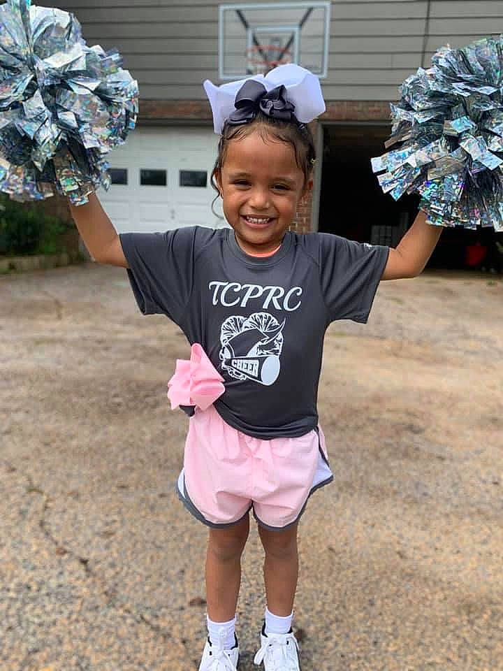 Anahi joined the competition — help win amazing prizes! black, child, clothing, costume, event, fun, hairstyle, happy, joy, person, pink, recreation, shoe, sleeve, smile, standing, street_fashion, sunglasses, t_shirt, toddler