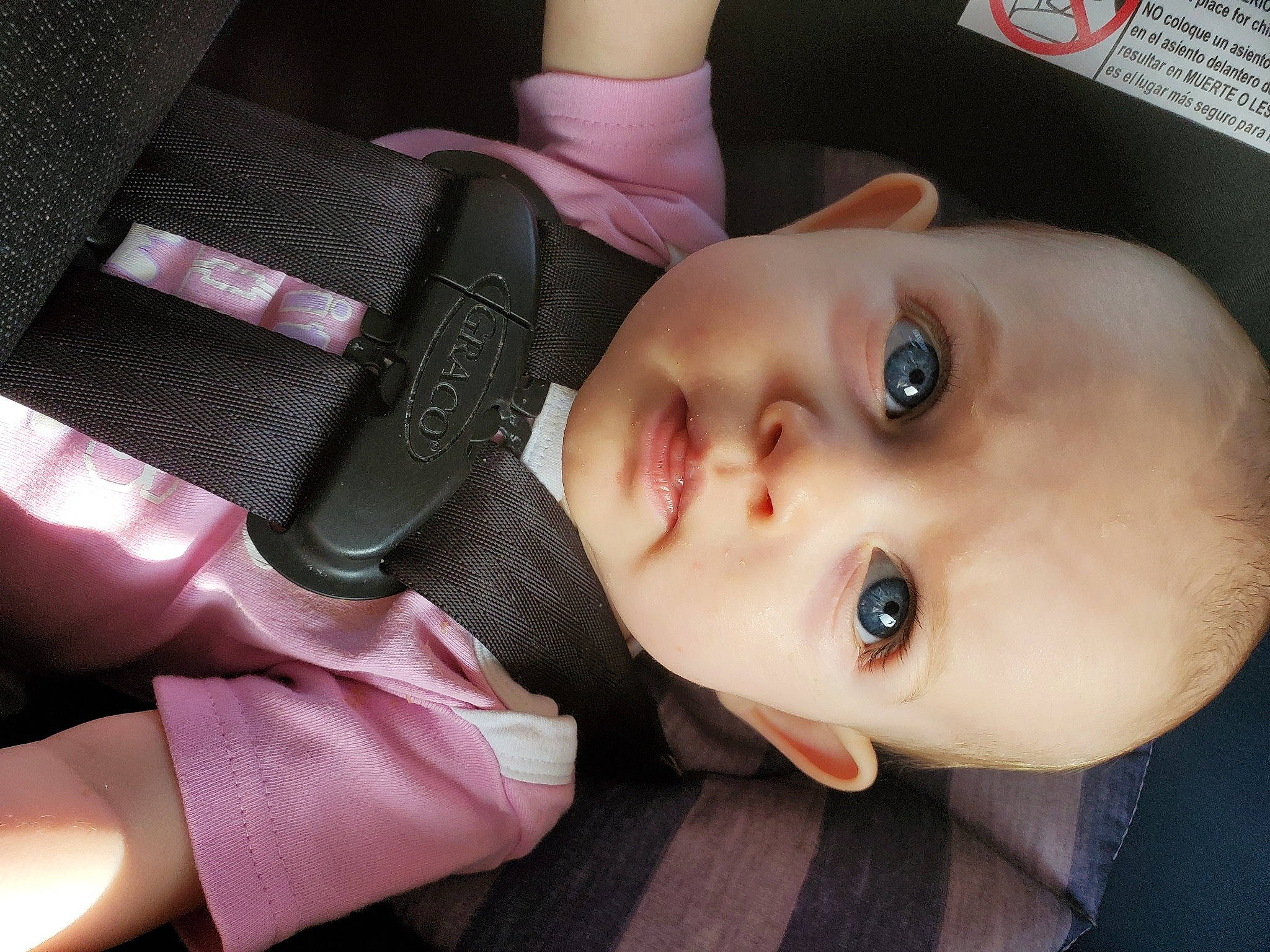 Alice is registered to the contest to win money with this photo: baby, cheek, child, chin, cool, eye, face, forehead, hand, head, human, lip, material_property, mouth, neck, nose, person, pink, product, skin