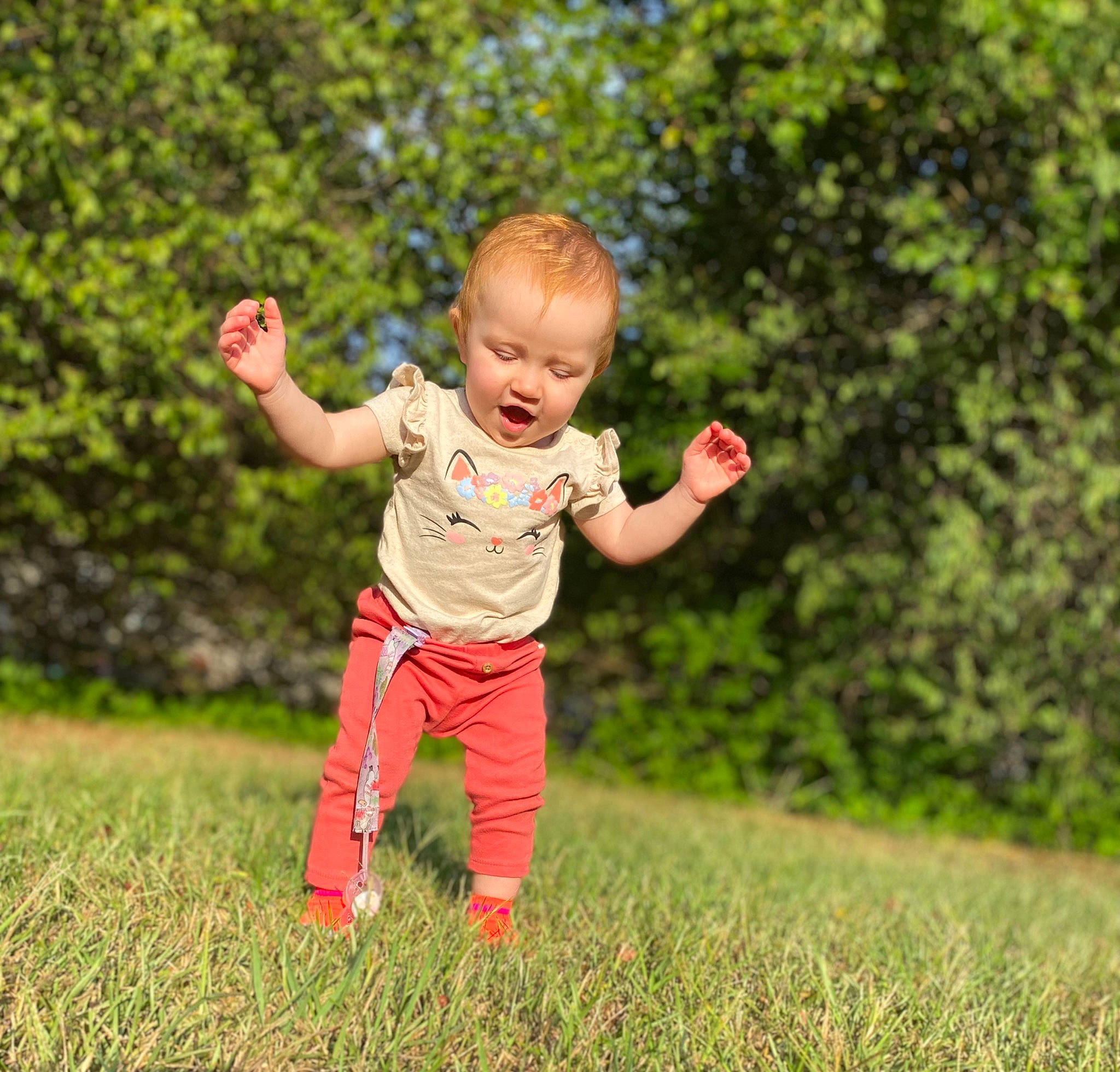 Charley joined the competition — help win amazing prizes! baby, baby_toddler_clothing, ball, finger, flash_photography, fun, gesture, grass, grassland, hand, happy, leisure, meadow, people_in_nature, person, plant, playing_with_kids, smile, thumb, toddler