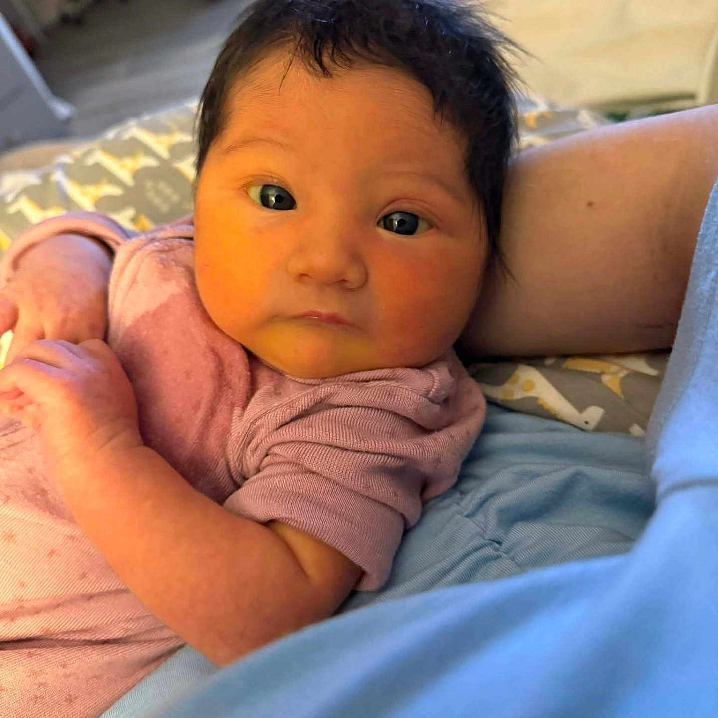 Autumn Lori is registered to the contest to win money with this photo: arm, baby, bed, blanket, candid, closeup, clothing, cozy, cute, eyes, face, hair, indoor, infant, newborn, person, portrait, resting, skin, soft_lighting