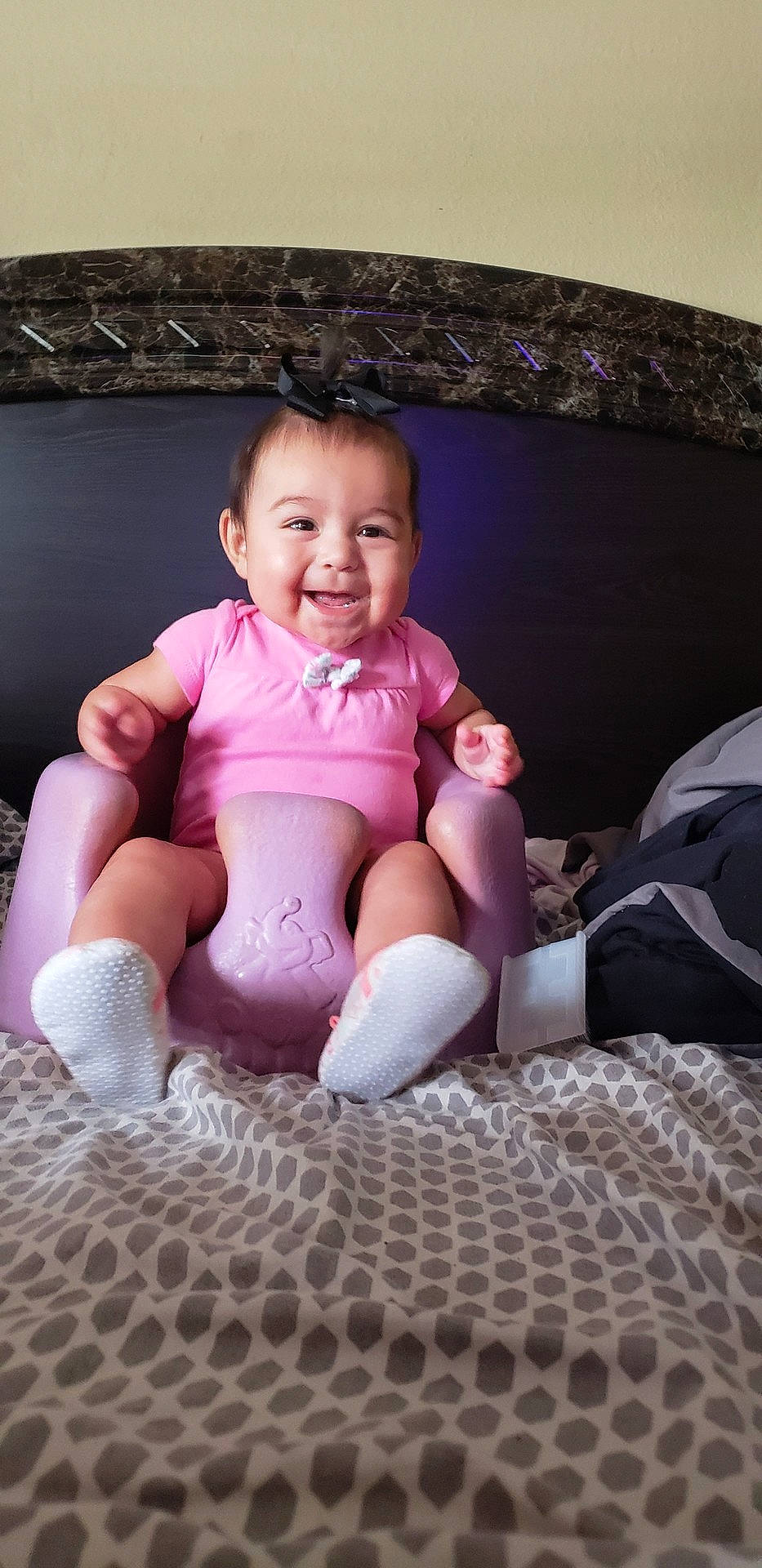 Jazlynn is registered to the contest to win money with this photo: beauty, child, day, flooring, fun, girl, hand, happiness, infant, joy, leg, person, photograph, pink, product, purple, sitting, skin, smile, toddler