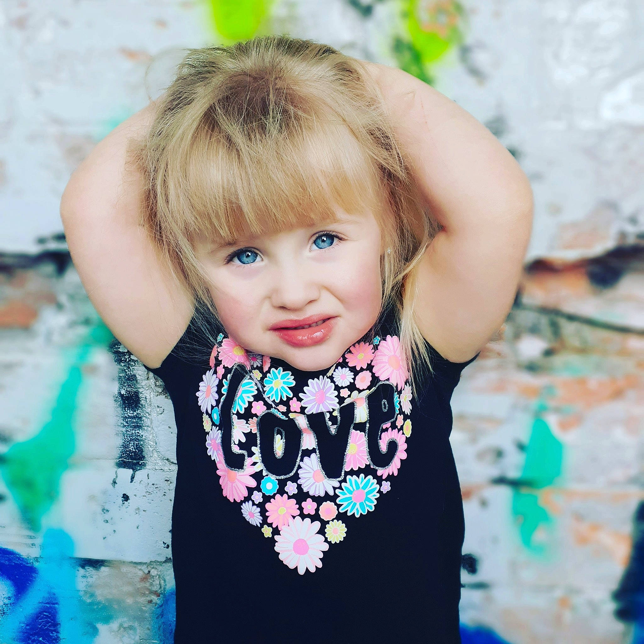 Gabriella Rose joined the competition — help win amazing prizes! baby, blond, cheek, child, child_model, cool, eye, face, fashion_accessory, hair, hairstyle, head, iris, pattern, person, photography, plant, sleeve, smile, t_shirt