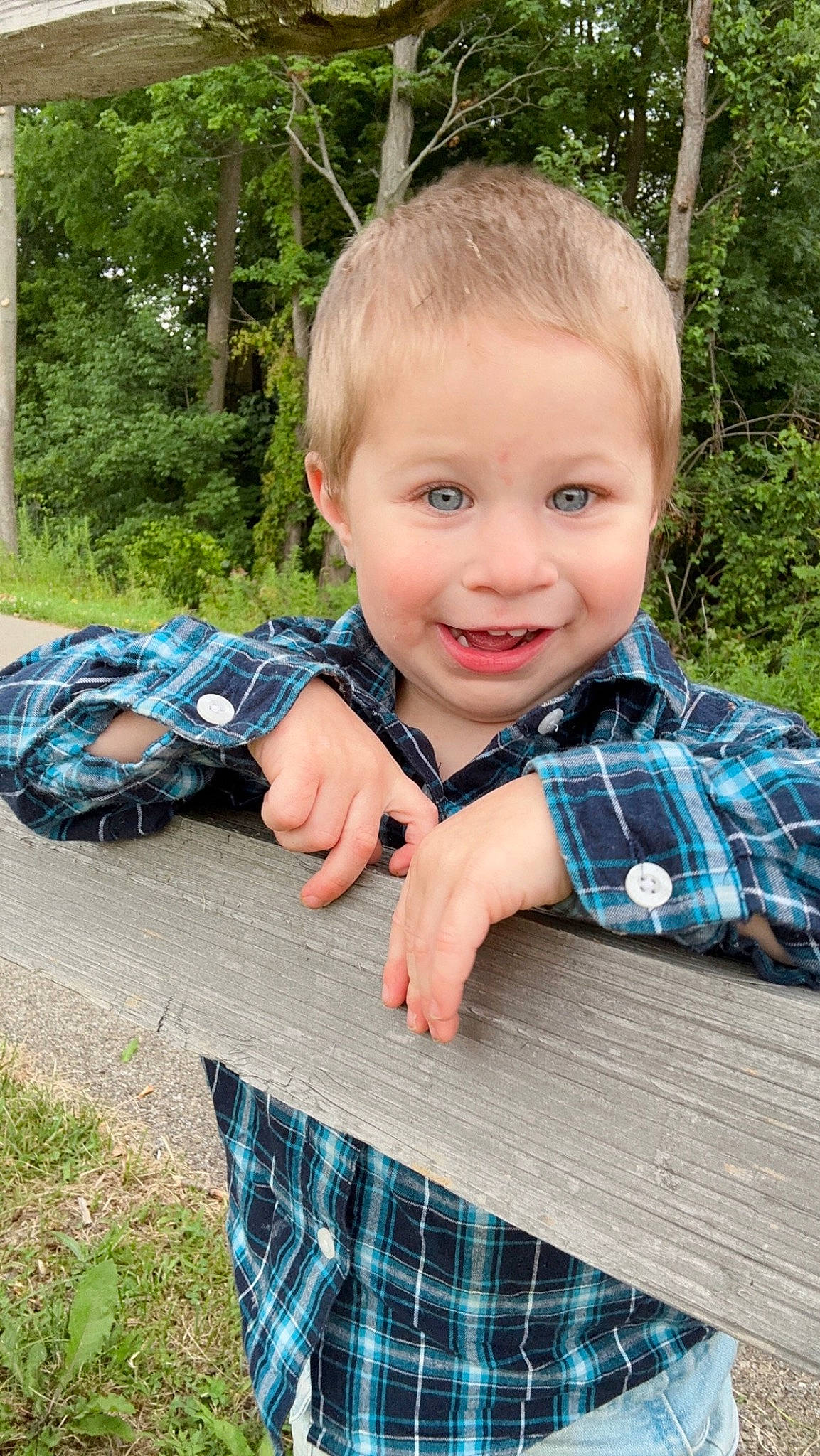 Hunter joined the competition — help win amazing prizes! baby_toddler_clothing, design, electric_blue, fun, grass, green, happy, joy, leaf, leisure, luggage_and_bags, pattern, people_in_nature, person, plaid, plant, sitting, smile, tartan, toddler