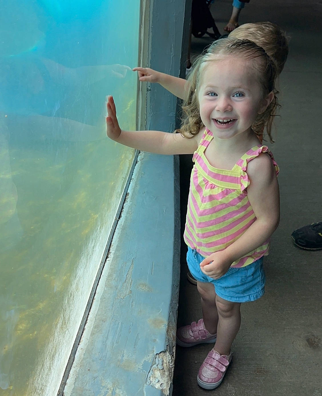 Addy joined the competition — help win amazing prizes! baby_toddler_clothing, child, eye, facial_expression, footwear, fun, gesture, hair, happy, head, joy, leisure, person, pink, shorts, skin, smile, standing, summer, toddler