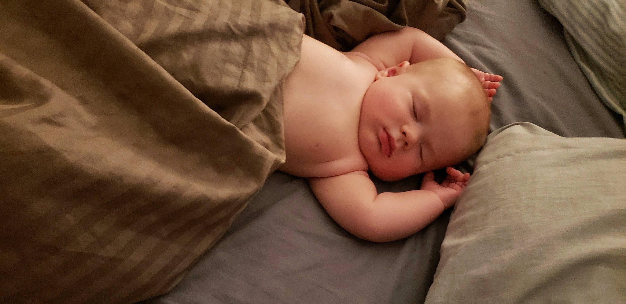 Vander is registered to the contest to win money with this photo: arm, baby, bedtime, cheek, child, comfort, ear, eye, face, finger, hand, head, lip, mouth, nap, nose, person, portrait_photography, skin, sleep