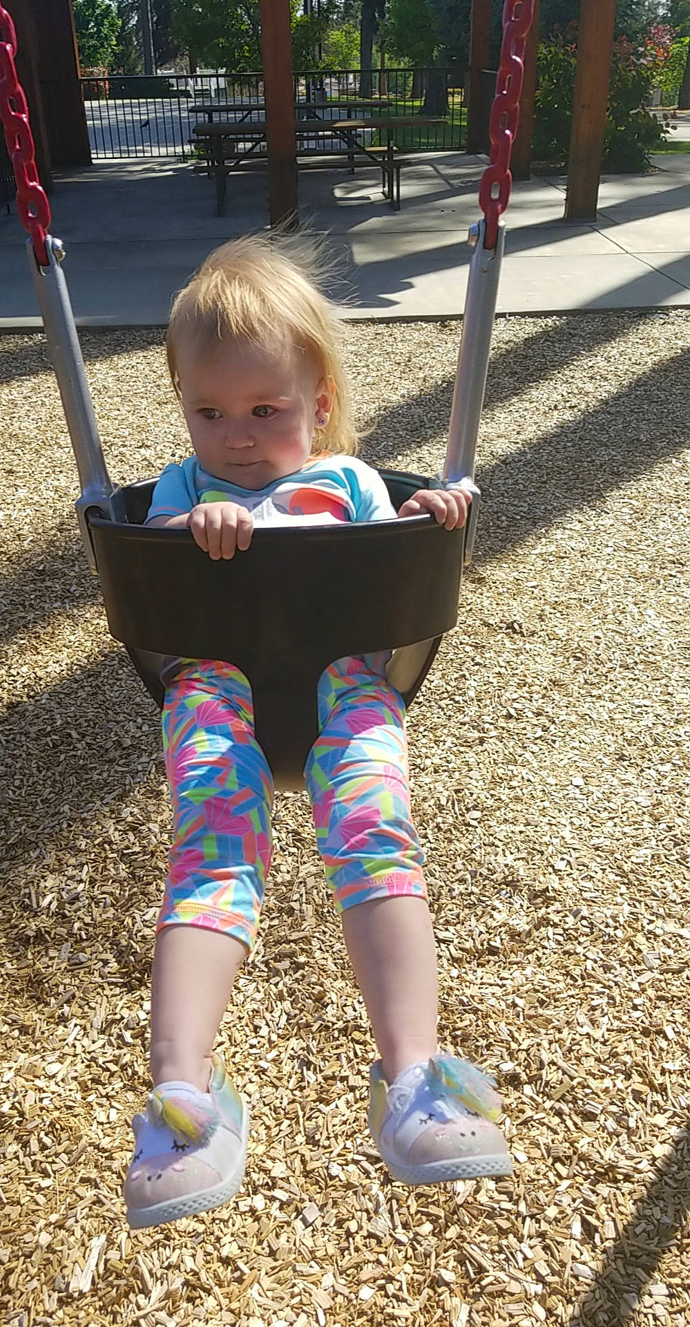 Kenzley joined the competition — help win amazing prizes! child, city, human_settlement, outdoor_play_equipment, person, play, playground, public_space, recreation, swing, toddler