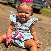 Emersyn joined the competition — help win amazing prizes! baby, child, smiling, outdoor, sunny, driveway, blue_outfit, pink_bow, bracelet, necklace, sitting, cute, happy, infant, accessories, daytime, vehicle, concrete, portrait, ruffled_sleeves