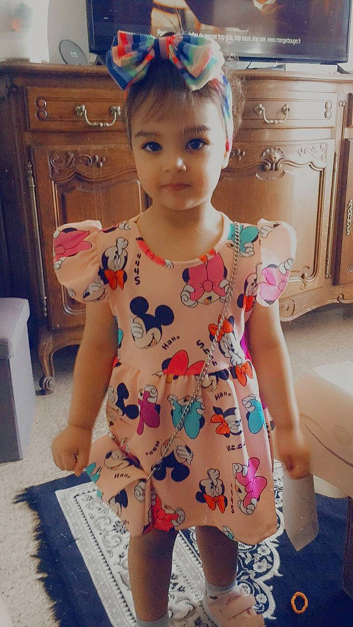 Miral Louiza participe au concours pour gagner de l'argent avec cette photo : baby_toddler_clothing, blond, cabinetry, child, day_dress, drawer, dress, fashion, fun, hairstyle, happy, head, iris, neck, one_piece_garment, person, pink, skin, sleeve, standing