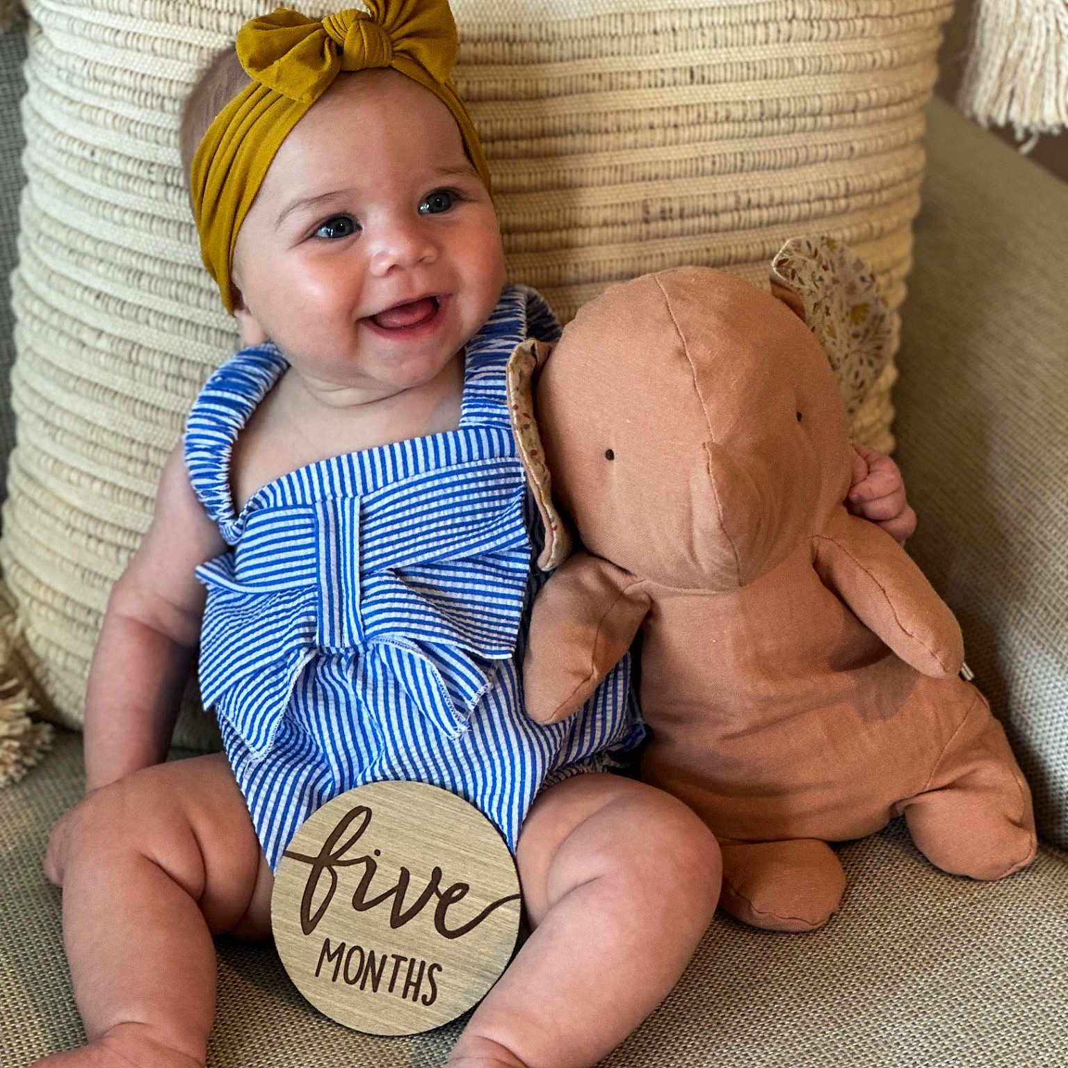 Adrijana Krneta joined the competition — help win amazing prizes! baby, chair, clothing, costume, couch, cushion, face, furniture, happy, hat, head, homedecor, pants, person, photography, pillow, portrait, sitting, teddybear, toy