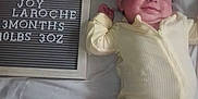 Natalie is registered to the contest to win money with this photo: architecture, baby, bed, blackboard, building, clothing, cushion, face, furniture, hat, head, homedecor, hospital, indoors, newborn, pants, person, photography, portrait, quilt