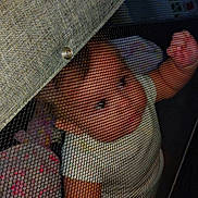 Natalie joined the competition — help win amazing prizes! baby, child, closeup, curious, cushion, cute, expression, fabric, face, grip, hands, indoor, infant, looking, mesh, netting, playpen, sitting, soft, toy