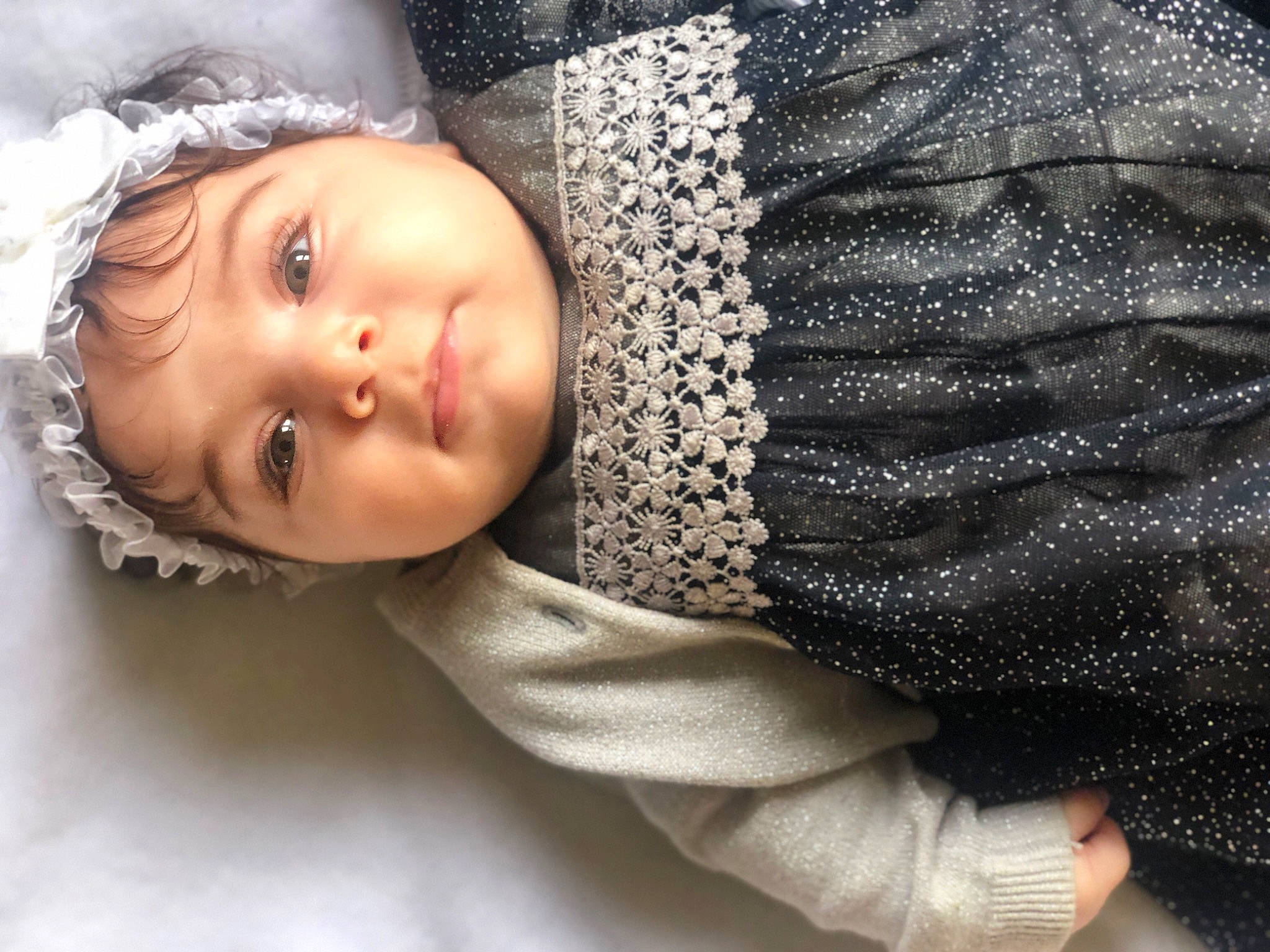 Melek participe au concours pour gagner de l'argent avec cette photo : arm, baby, baby_toddler_clothing, cheek, chin, comfort, cool, eyebrow, flash_photography, happy, headgear, headwear, human_body, lip, mouth, nose, person, skin, sleeve, toddler