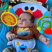 Braxtin joined the competition — help win amazing prizes! baby, bodypart, chair, clothing, couch, cushion, diaper, face, finger, furniture, hand, head, homedecor, outdoors, person, photography, portrait, sleeping, t_shirt, toy