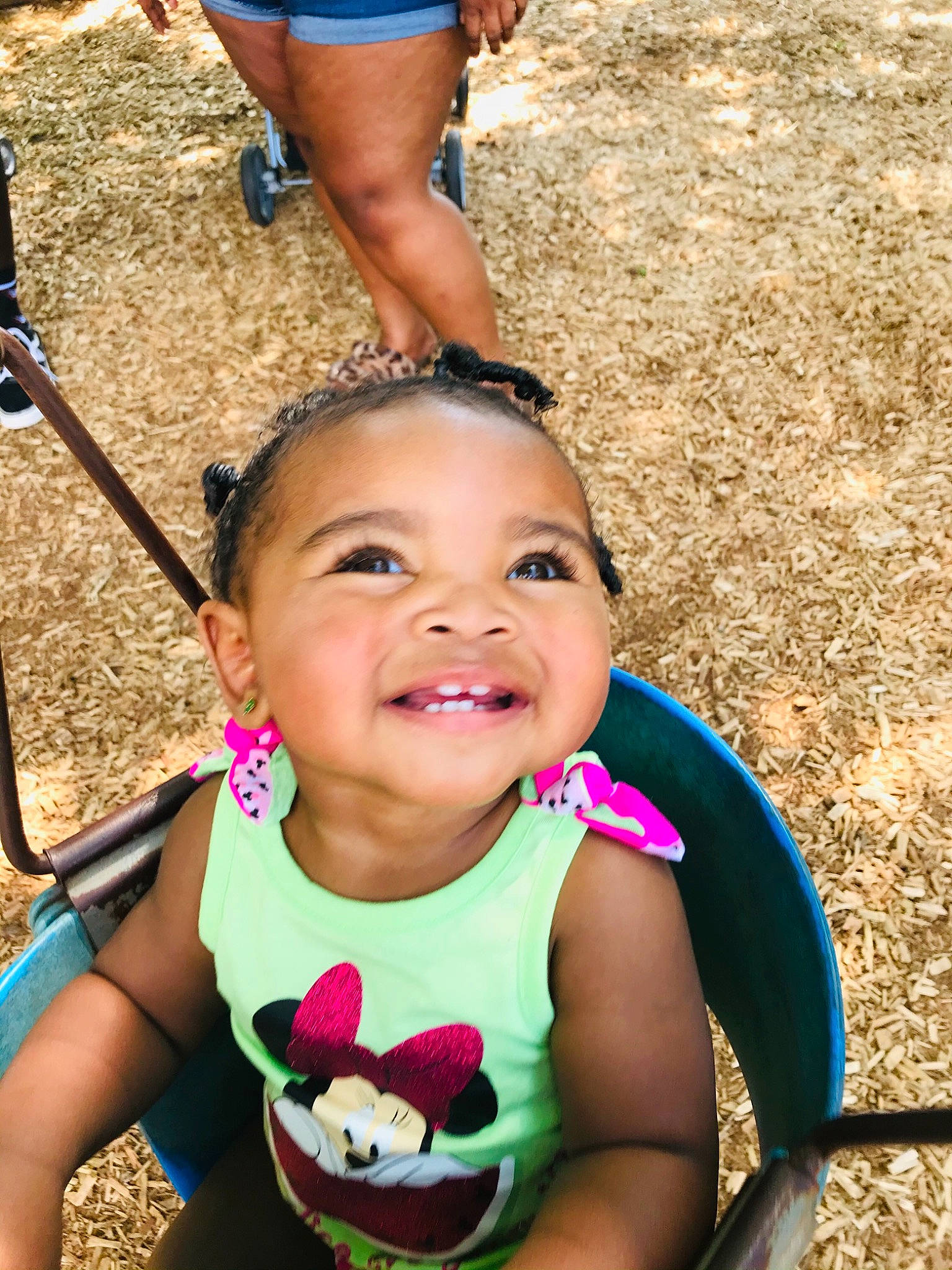 Kaliyah is registered to the contest to win money with this photo: baby_toddler_clothing, black, blue, cheek, chin, face, grass, hairstyle, happy, iris, joy, lip, mouth, organ, person, photograph, pink, product, skin, smile