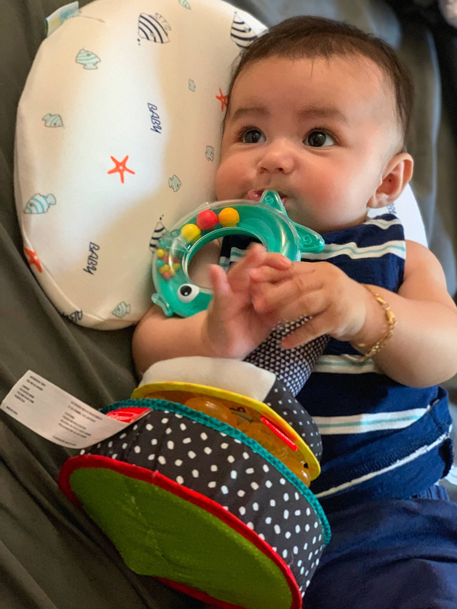 Gael is registered to the contest to win money with this photo: baby, baby_products, baby_toddler_clothing, cheek, child, event, facial_expression, finger, fun, happy, head, holiday, iris, nail, pattern, person, personal_protective_equipment, play, sitting, skin
