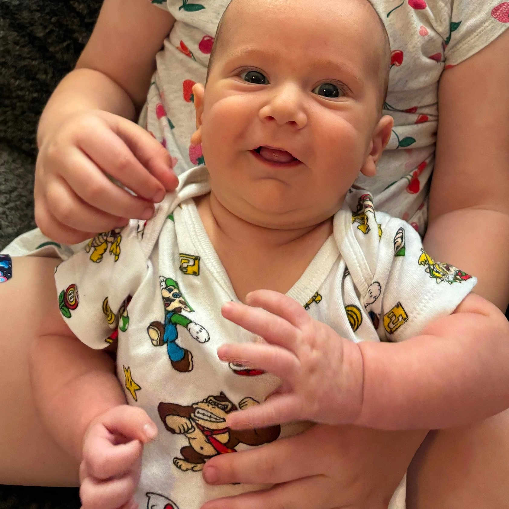 Asher joined the competition — help win amazing prizes! accessories, baby, babylaughing, bodypart, bracelet, clothing, face, finger, hand, happy, head, jewelry, necklace, newborn, person, photography, portrait, sitting, sleeve, smile