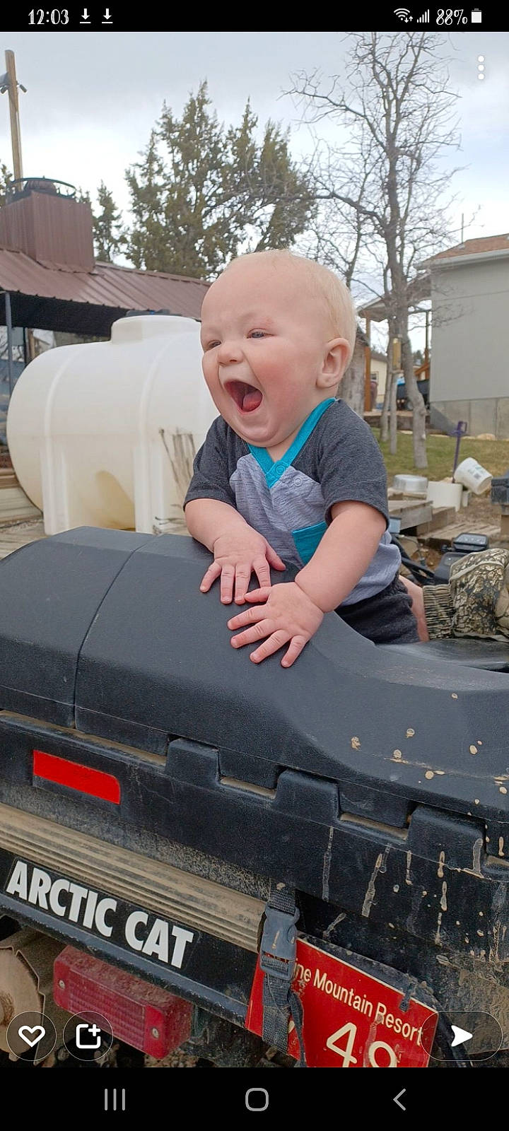 Kelson is registered to the contest to win money with this photo: asphalt, auto_part, automotive_design, automotive_exterior, automotive_tire, baby, baby_toddler_clothing, bumper, fender, gas, motor_vehicle, person, plant, recreation, sky, smile, t_shirt, toddler, tree, vehicle
