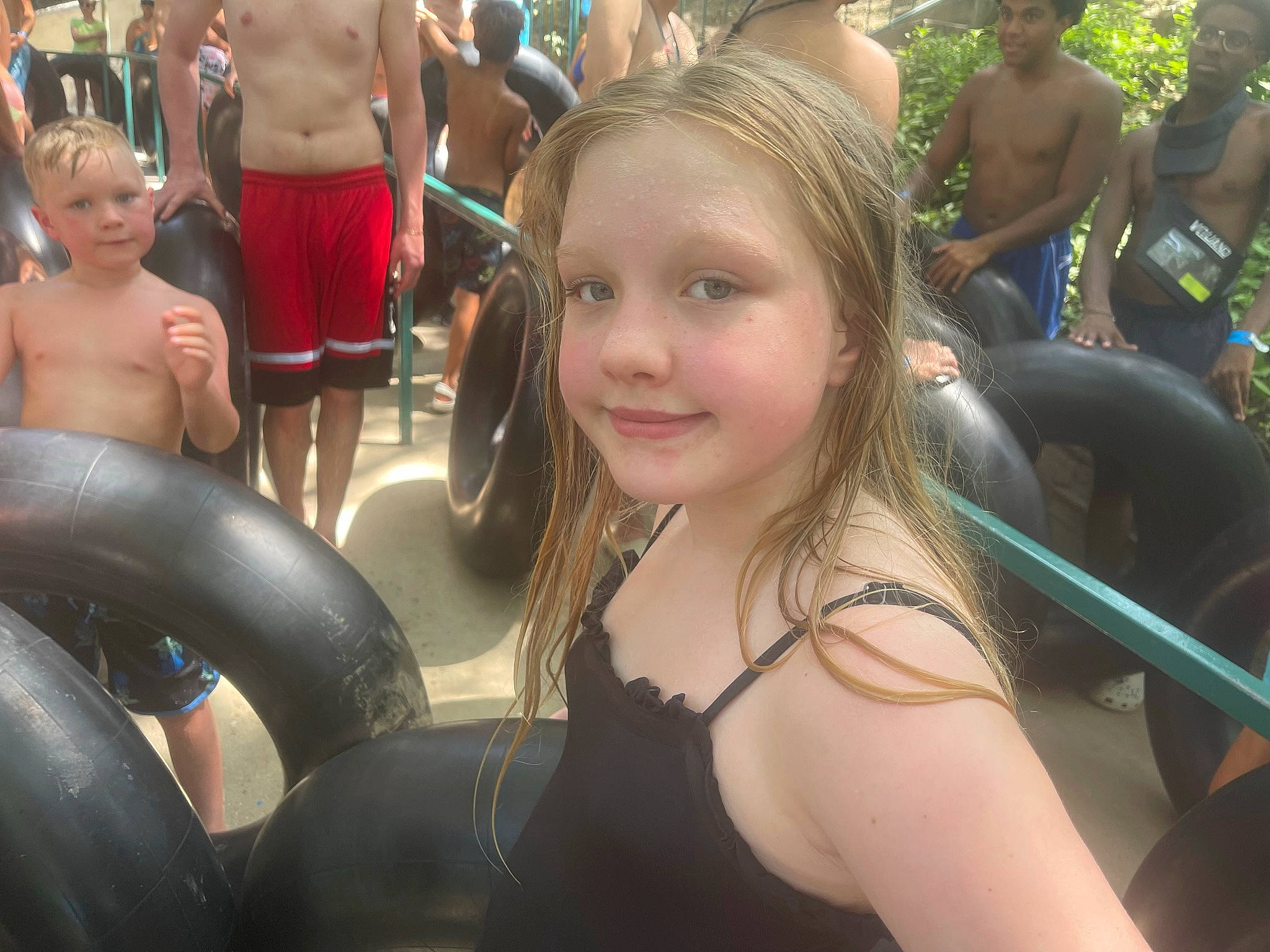 Kaylee is registered to the contest to win money with this photo: blond, chest, crowd, event, eyewear, face, fun, human_body, joy, leg, leisure, muscle, people, person, recreation, shorts, smile, summer, sunglasses, swimwear