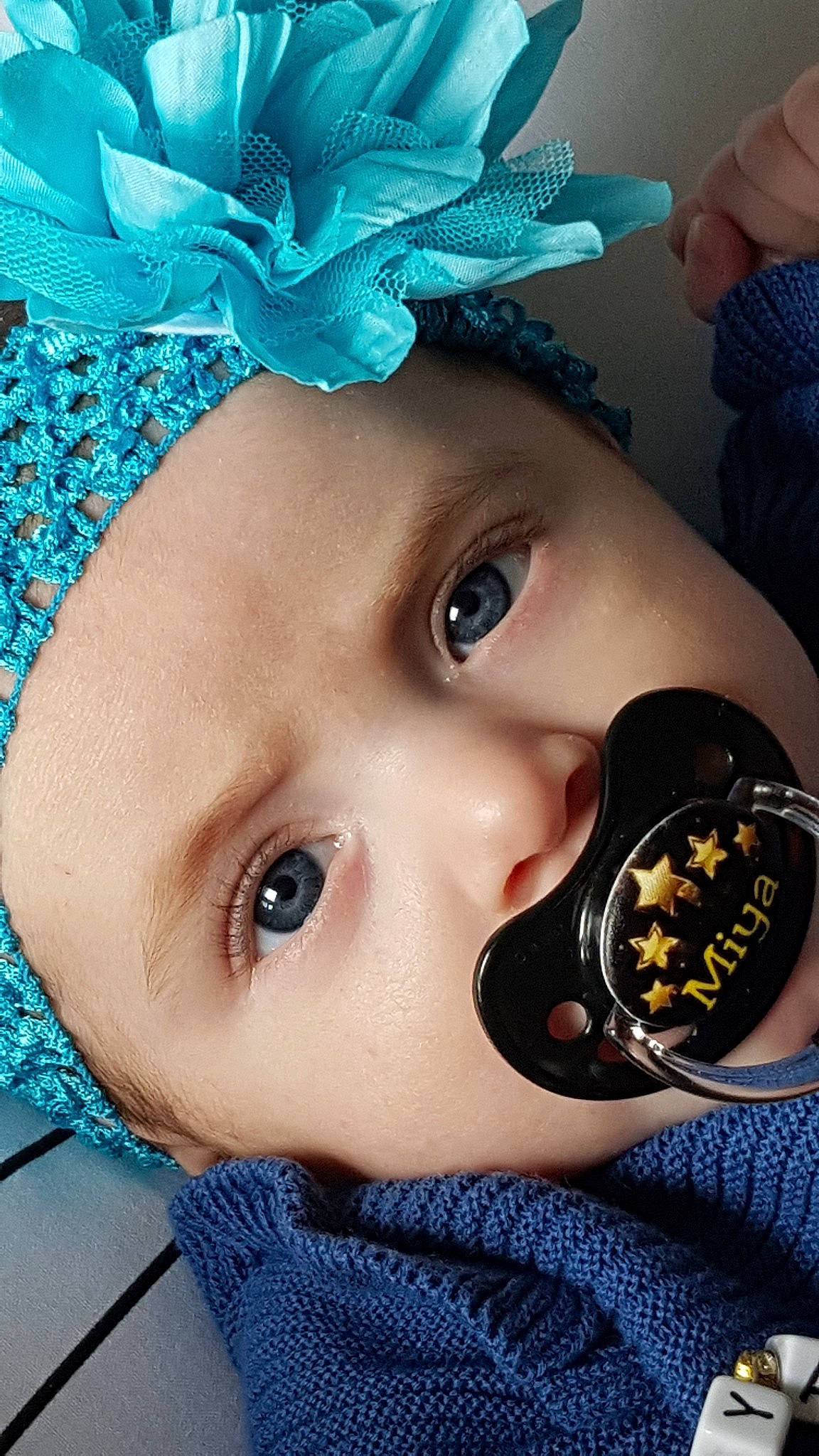 Miya participe au concours pour gagner de l'argent avec cette photo : baby, cheek, child, ear, eye, eyelash, forehead, head, headwear, lip, nose, person, toddler
