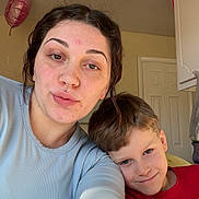 Benjamin is registered to the contest to win money with this photo: adult, architecture, clothing, couch, cushion, door, face, female, furniture, happy, head, homedecor, people, person, photography, portrait, selfie, smile, t_shirt, woman