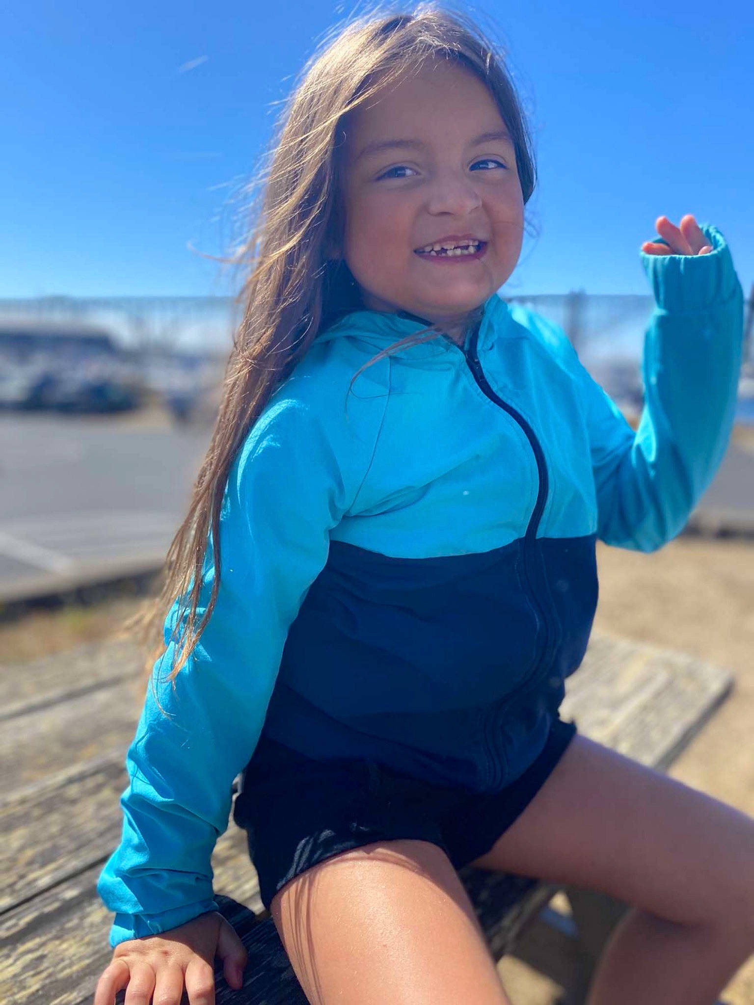 Hananiah is registered to the contest to win money with this photo: azure, blue, eye, face, flash_photography, gesture, hair, happy, head, human_body, joy, knee, leg, person, shoulder, skin, sky, sleeve, smile, standing