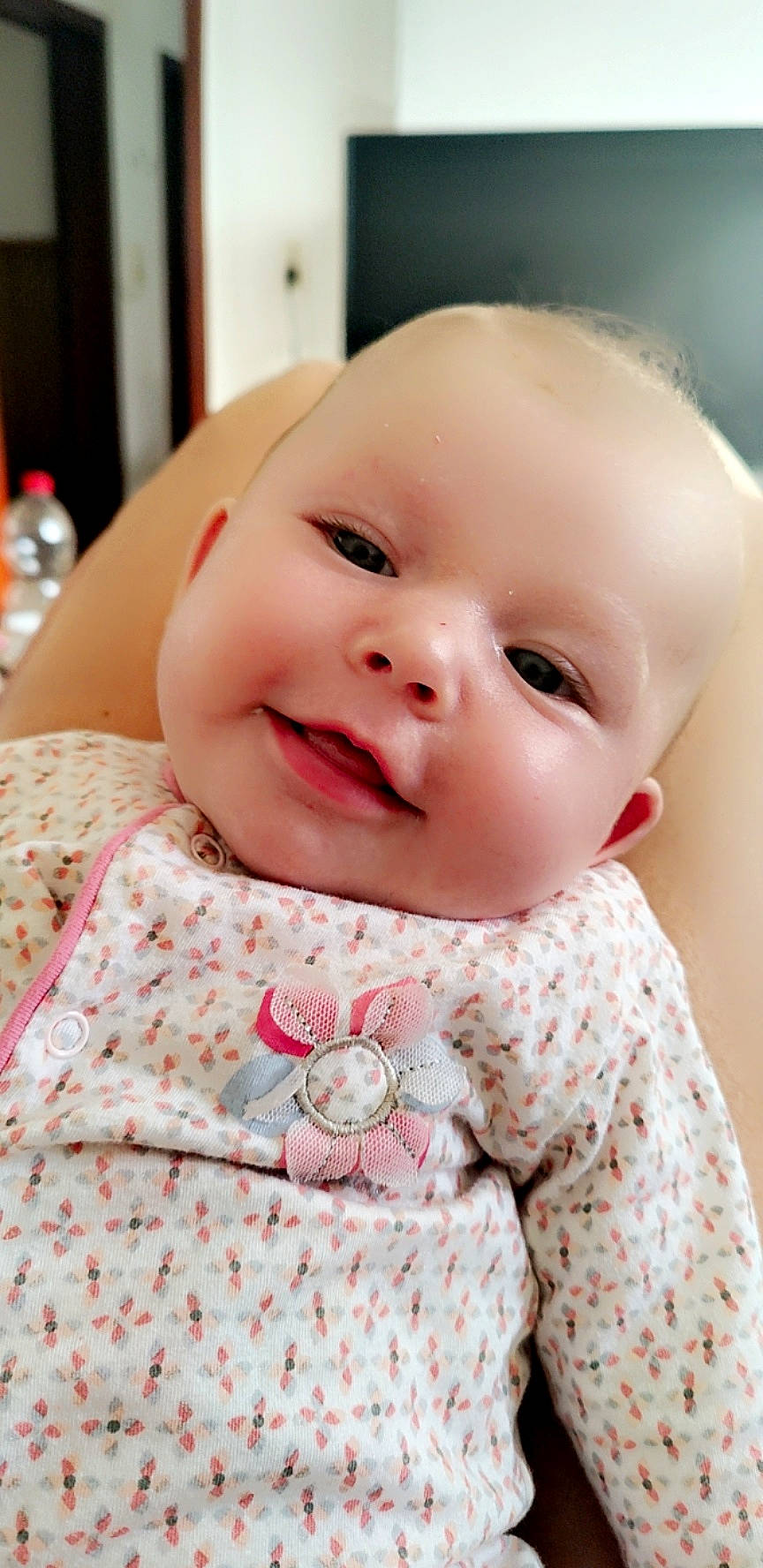 Clarissa participe au concours pour gagner de l'argent avec cette photo : baby, baby_laughing, baby_toddler_clothing, cheek, child, collar, dress, eyelash, happy, iris, laugh, linens, lip, nose, pattern, person, pink, skin, sleeve, smile