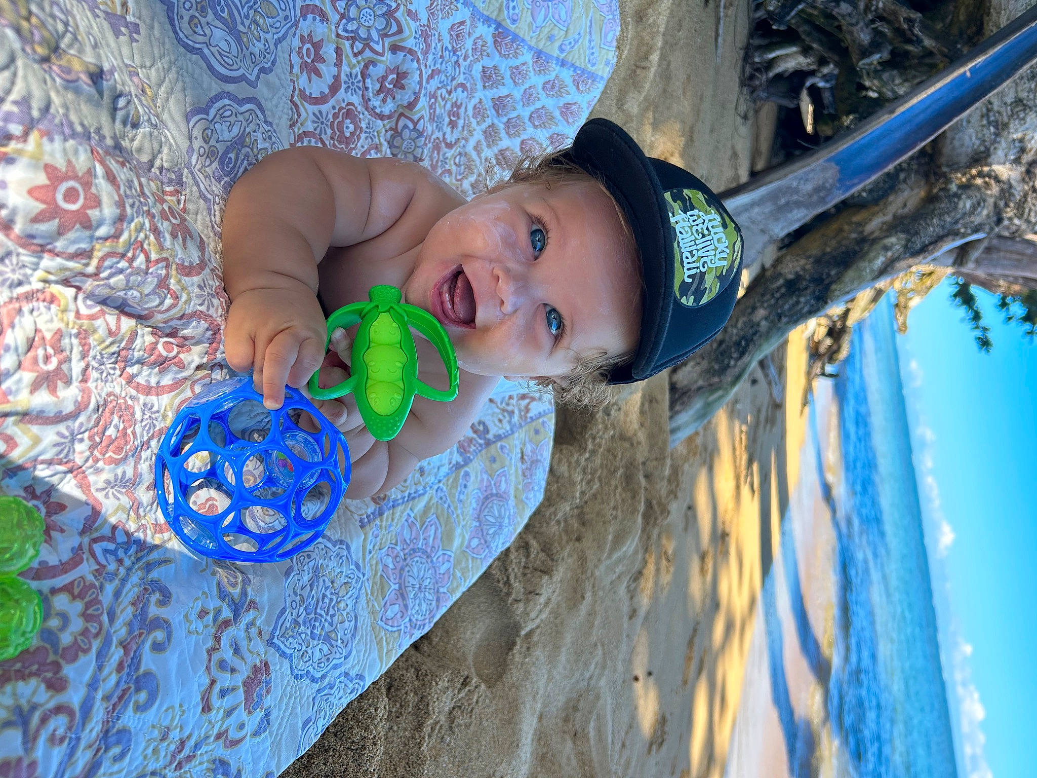 Titus joined the competition — help win amazing prizes! azure, blue, circle, electric_blue, fashion_accessory, flash_photography, fun, grass, happy, hat, headwear, leisure, linens, pattern, people_in_nature, person, portrait_photography, smile, vacation, visual_arts