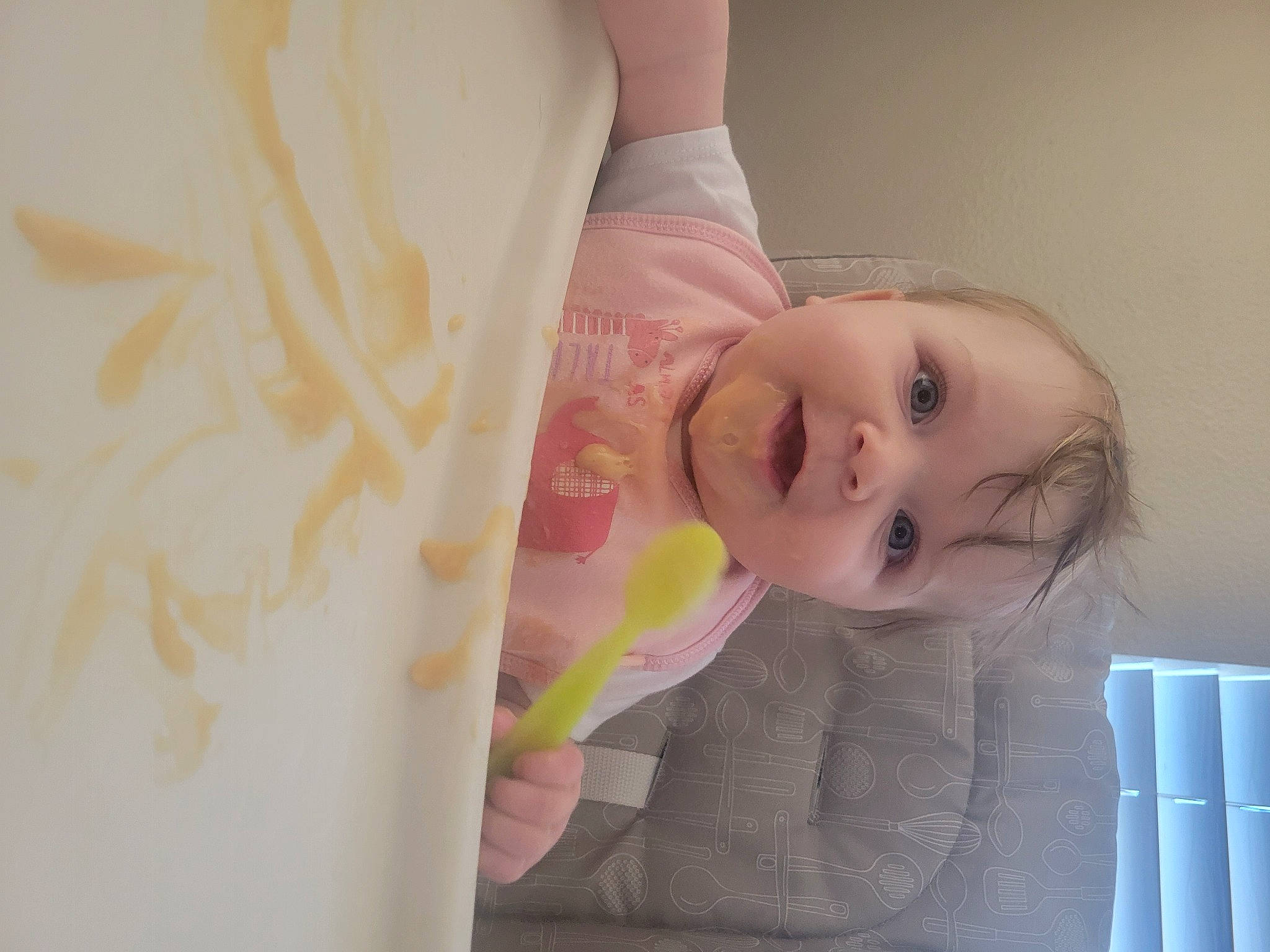 Mia is registered to the contest to win money with this photo: baby, baby_products, baby_toddler_clothing, child, comfort, elbow, eyelash, gesture, happy, human_leg, linens, lip, magenta, neck, pattern, peach, person, room, skin, sleeve