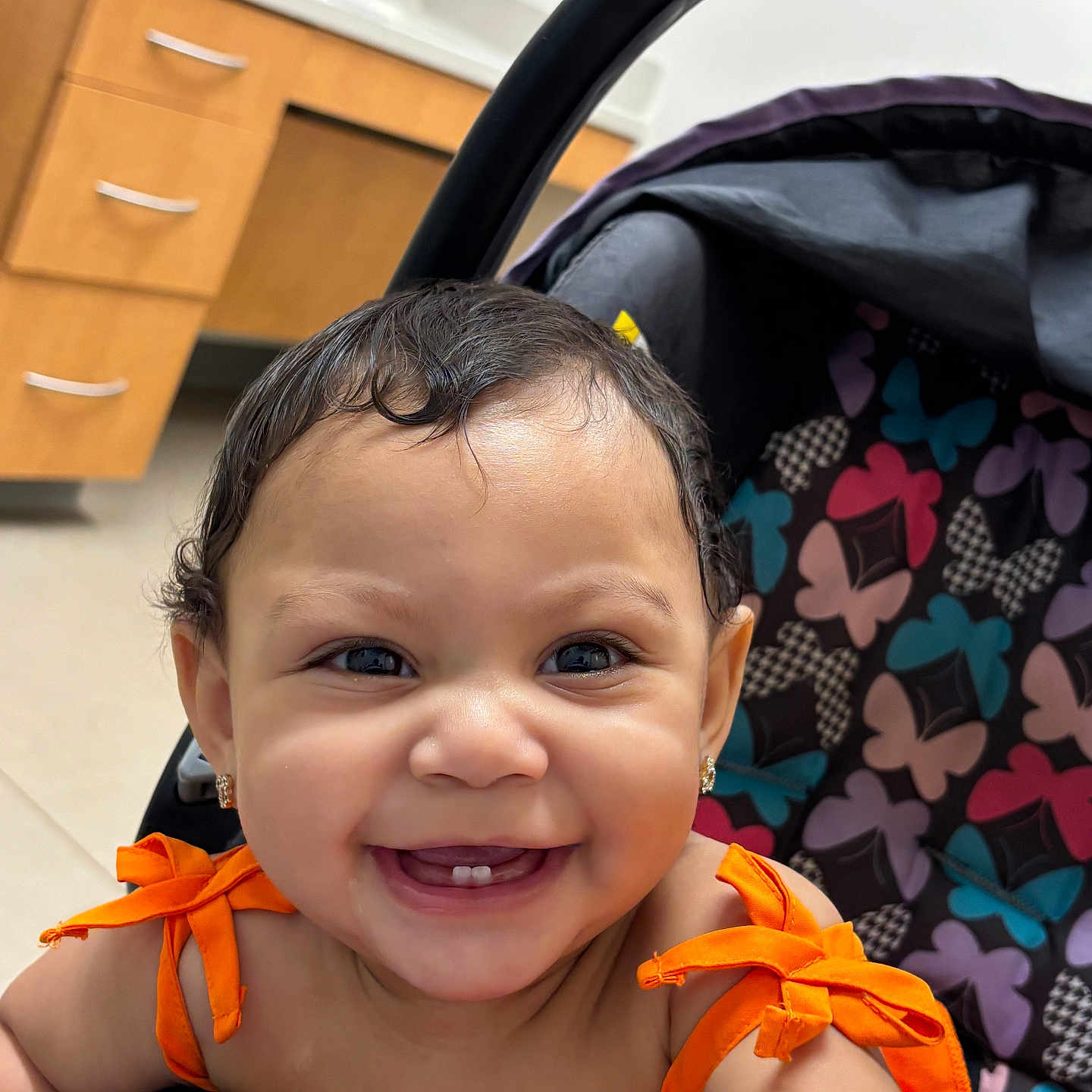 Aahmiyahlovely joined the competition — help win amazing prizes! baby, child, smile, happy, orange_dress, stroller, butterfly_pattern, indoor, cute, portrait, infant, earrings, face, closeup, cheerful, person, toddler, clothing, seat, joy