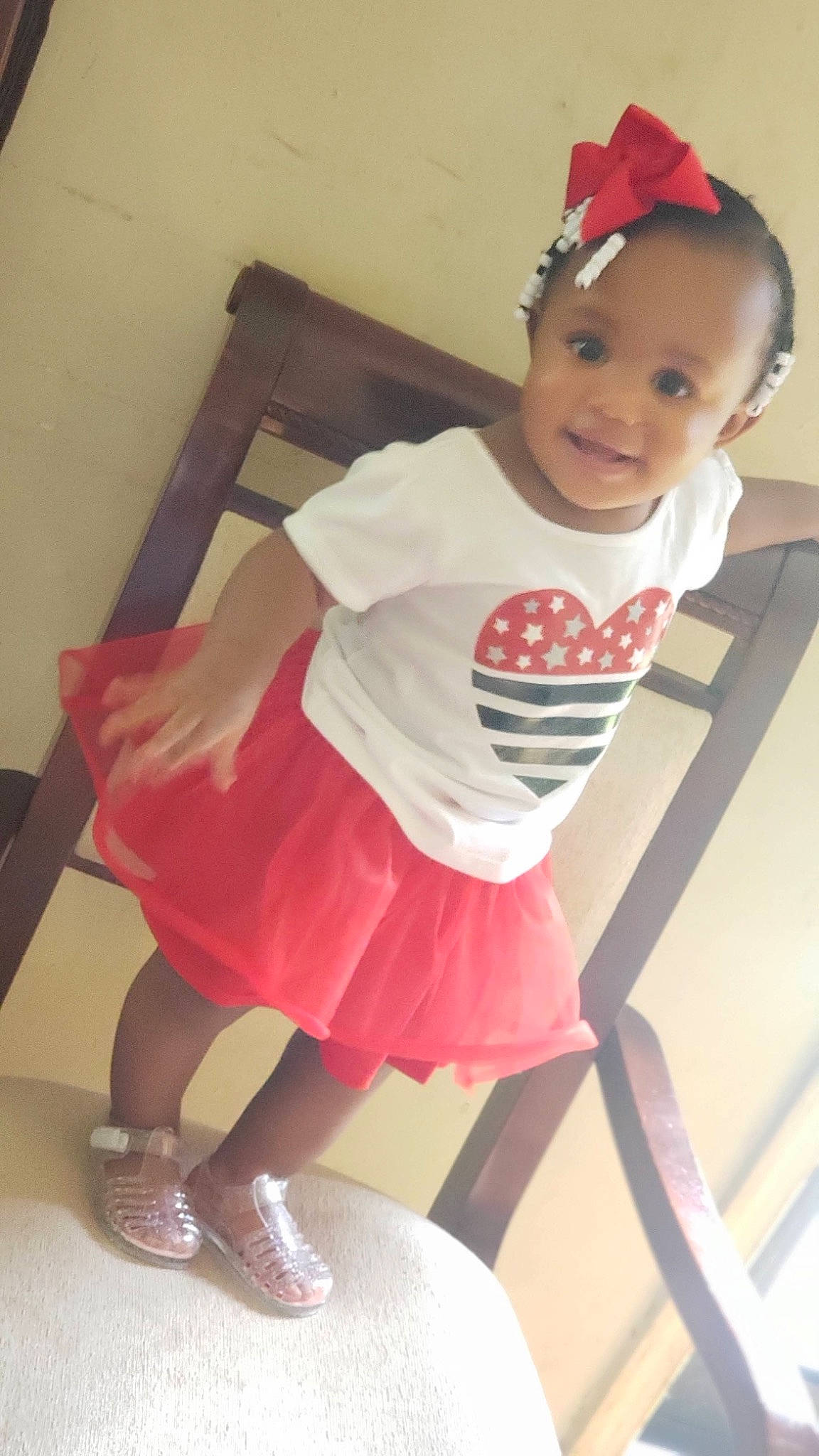 Iyana joined the competition — help win amazing prizes! baby, baby_toddler_clothing, child, costume_hat, fun, goggles, happy, hat, headband, human_leg, joy, knee, leg, magenta, person, pink, sleeve, smile, sunglasses, t_shirt