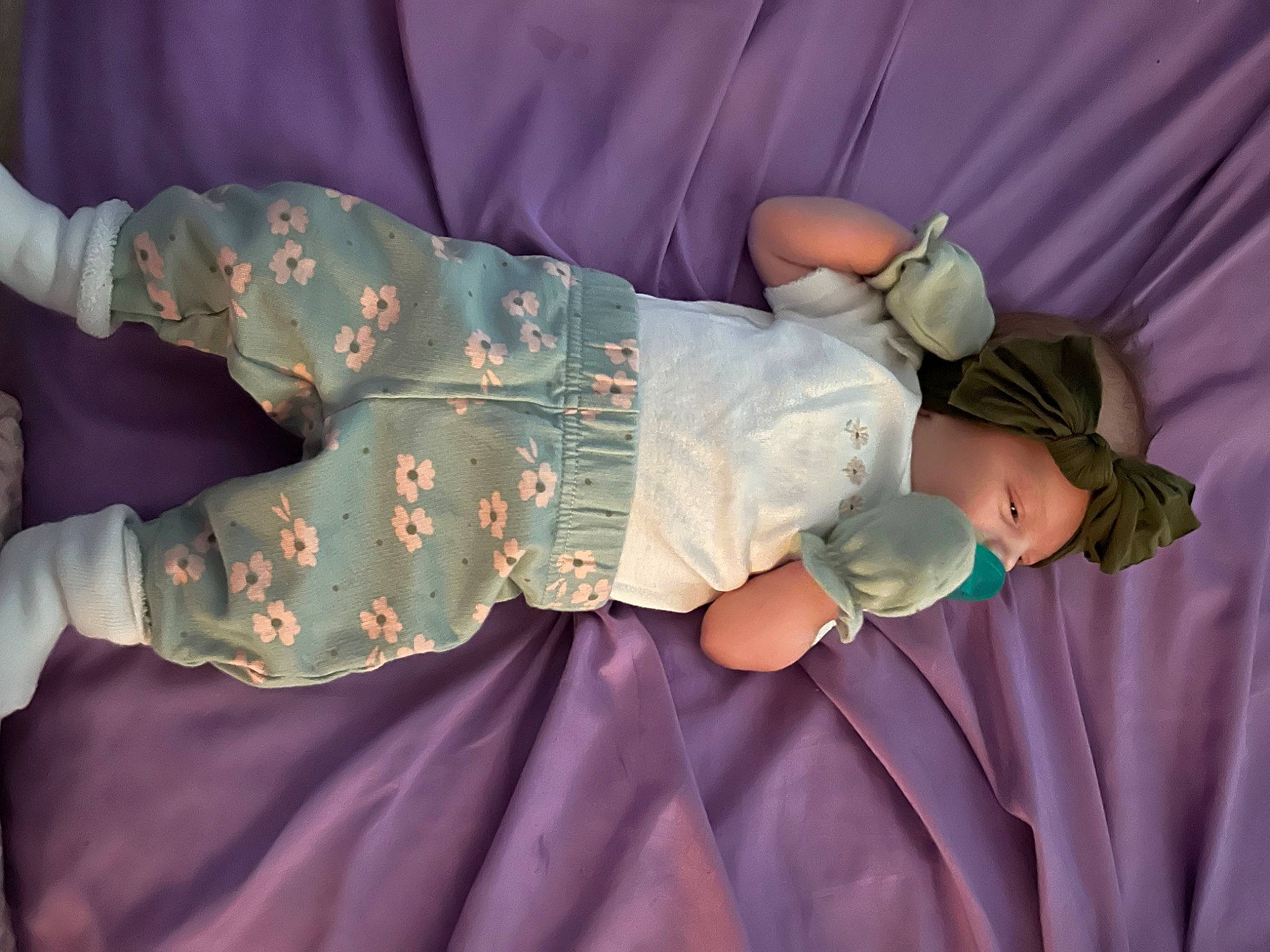 Ariella joined the competition — help win amazing prizes! arm, baby, baby_toddler_clothing, comfort, dress, finger, gesture, hand, human_body, joint, leg, pattern, person, pink, product, purple, skin, sleeve, textile, toddler