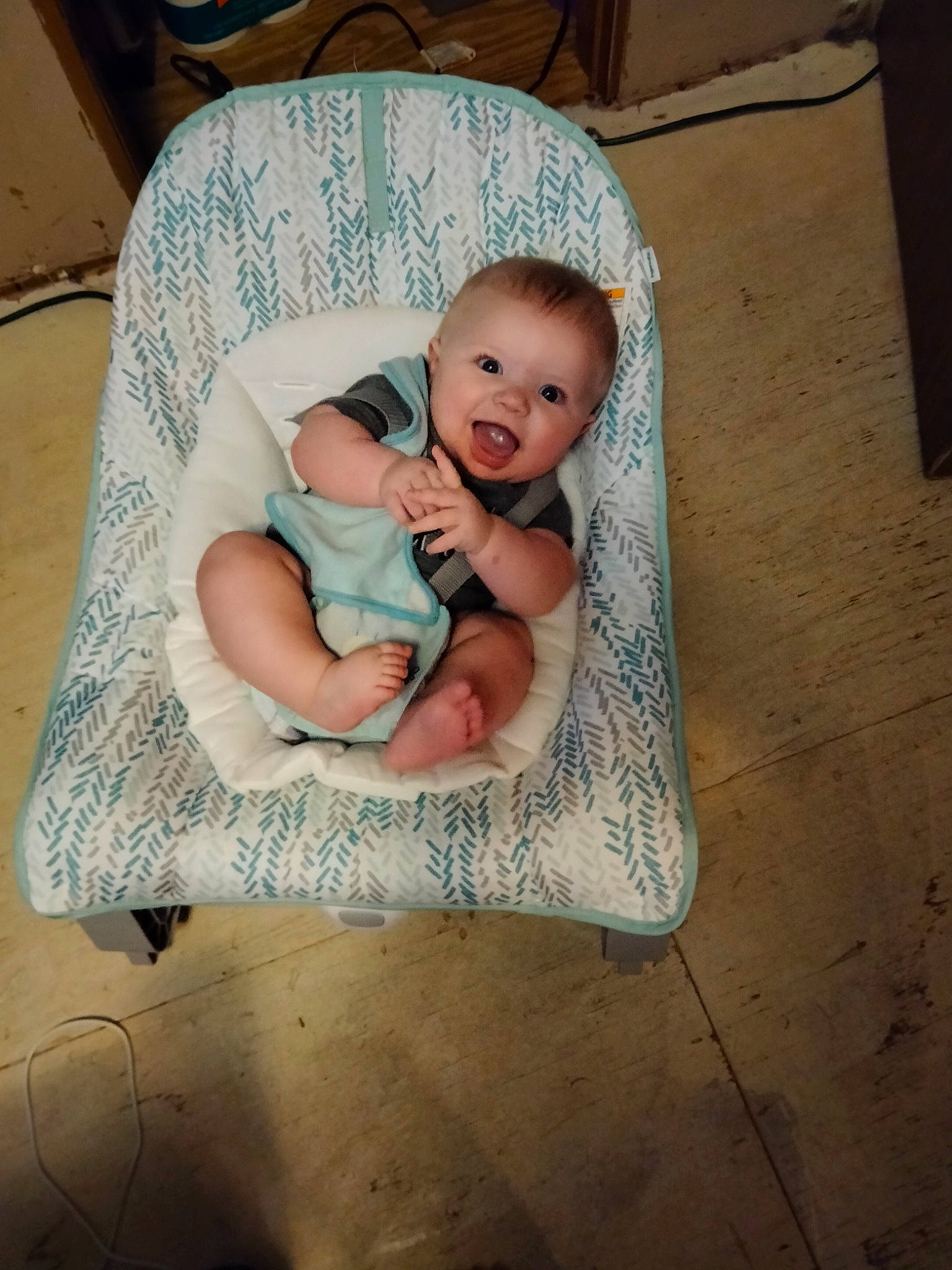 Konner joined the competition — help win amazing prizes! baby, baby_products, baby_toddler_clothing, chair, cheek, child, comfort, flash_photography, flooring, fun, happy, human_body, iris, lap, linens, person, sitting, skin, smile, toddler
